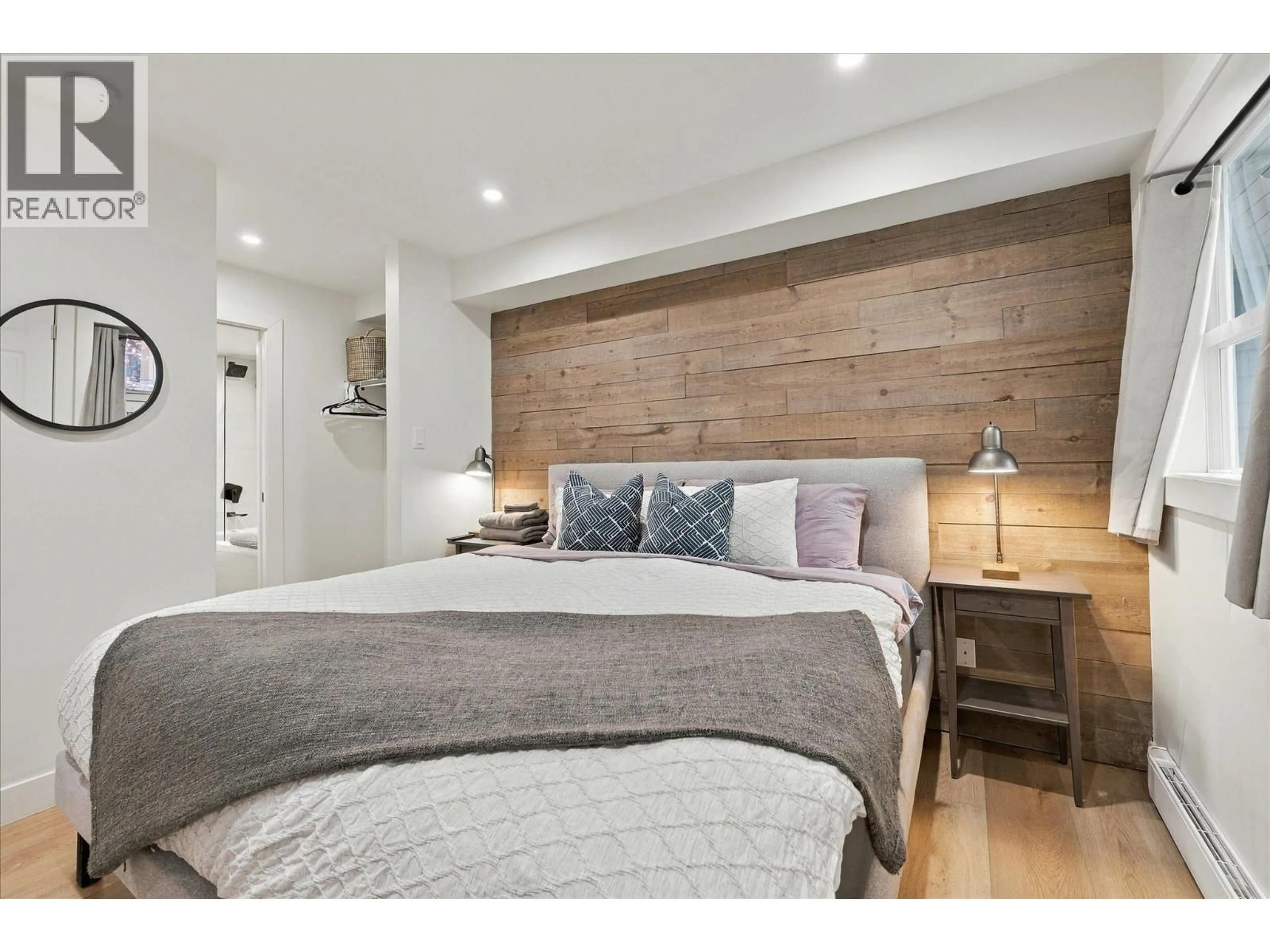 Bedroom with bed, wood/laminate floor for 77/77A - 4388 NORTHLANDS BOULEVARD, Whistler British Columbia V8E1C6