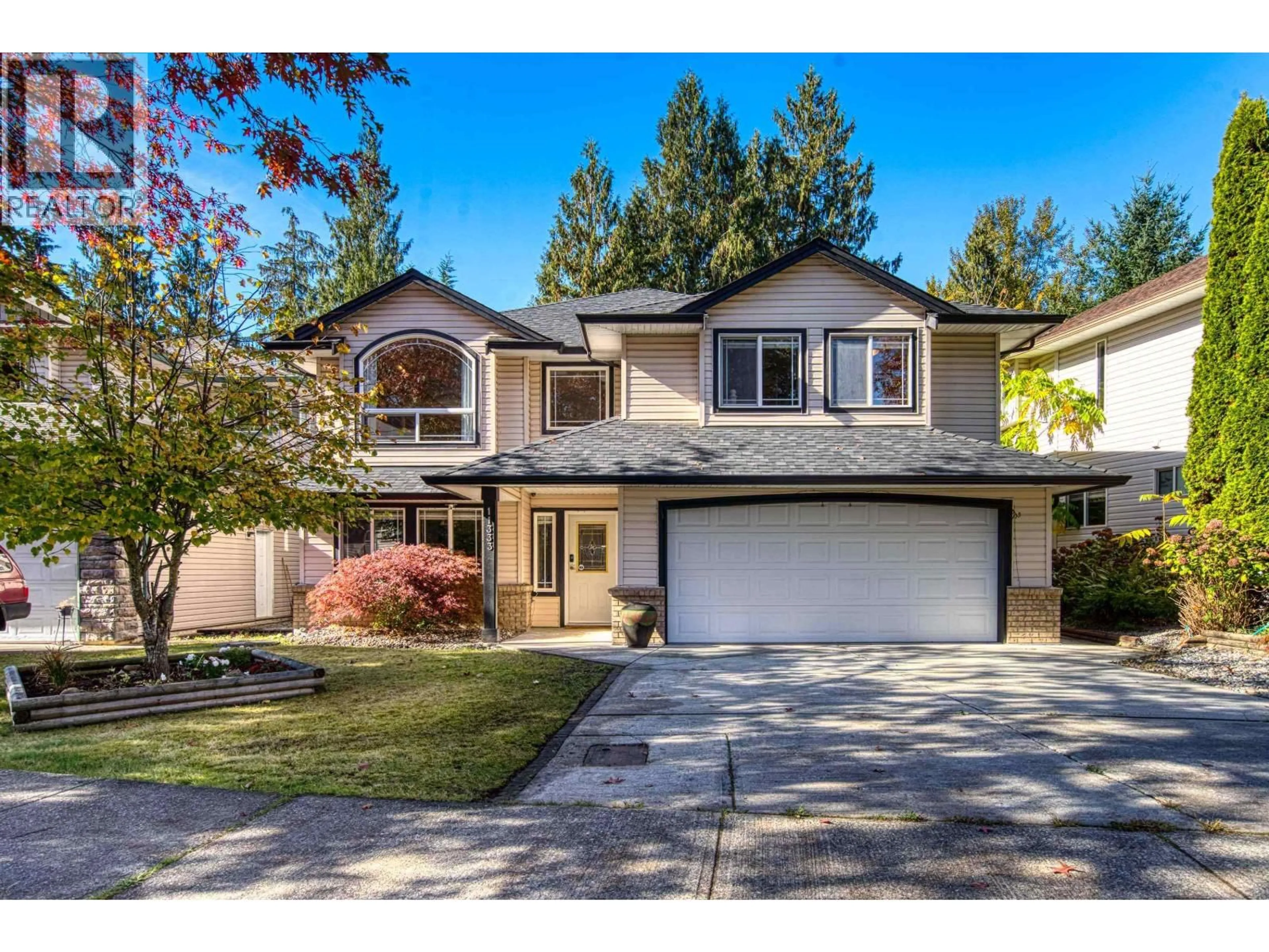 Home with vinyl exterior material, street for 11333 238 STREET, Maple Ridge British Columbia V2W1V4