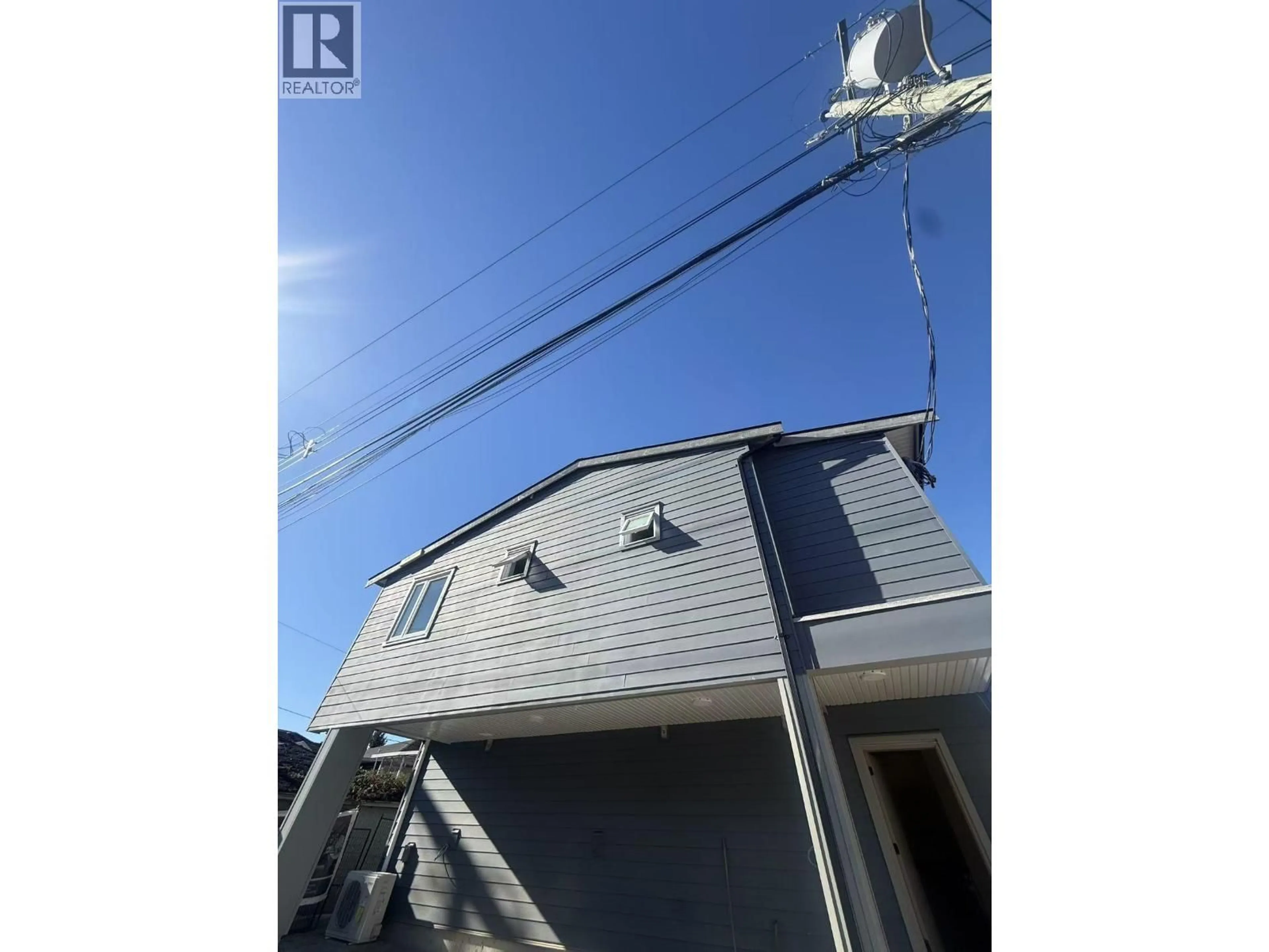 A pic from outside/outdoor area/front of a property/back of a property/a pic from drone, street for 4636 KNIGHT STREET, Vancouver British Columbia V5N3N1