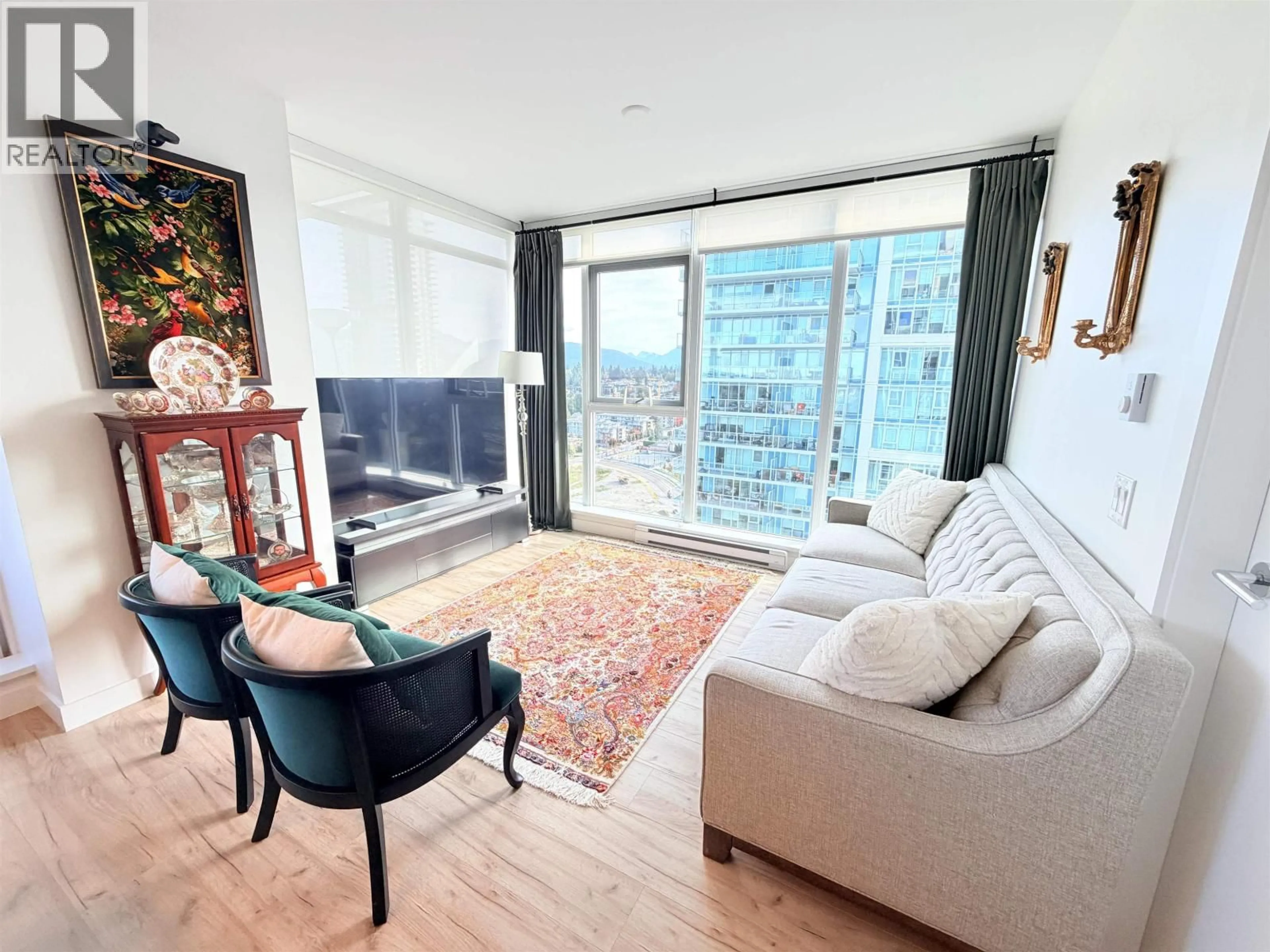 Living room with furniture, wood/laminate floor for 2509 - 652 WHITING WAY, Coquitlam British Columbia V3J0K3