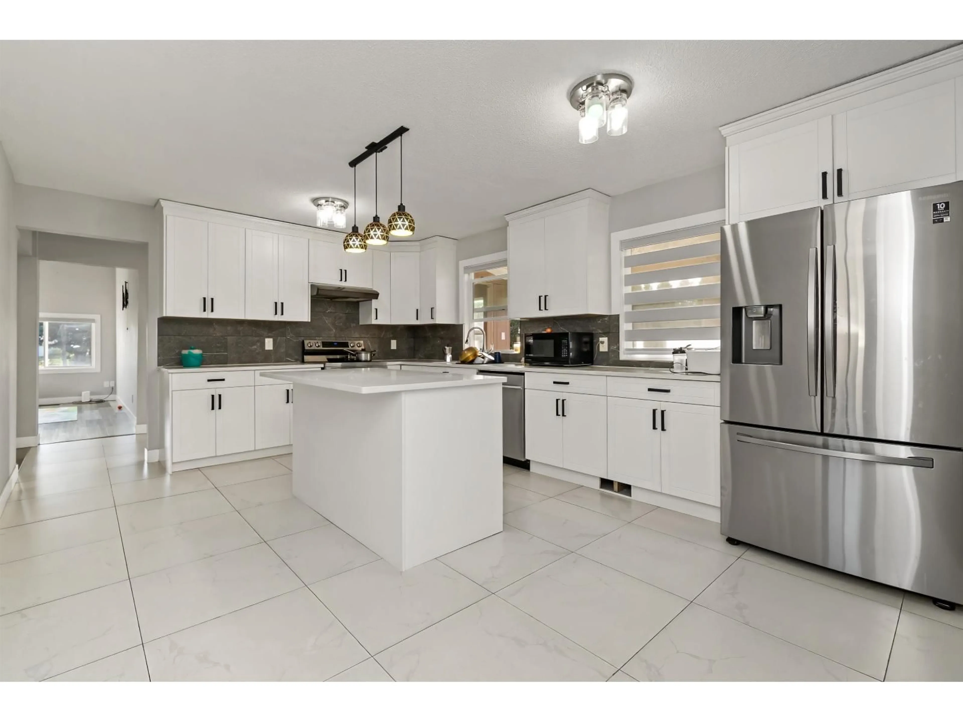Open concept kitchen, ceramic/tile floor for 48247 YALE ROAD, Chilliwack British Columbia V4Z0A8