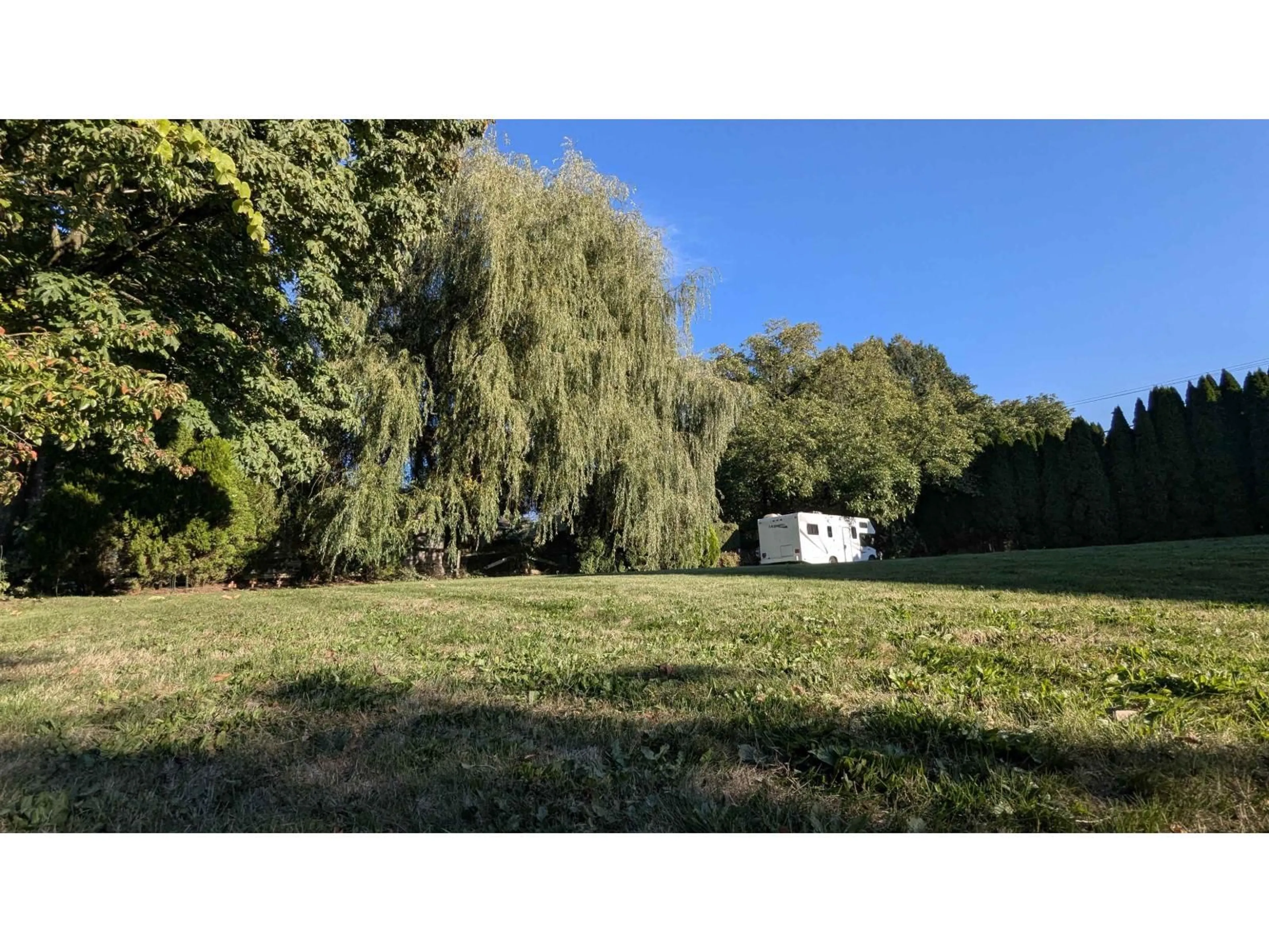 A pic from outside/outdoor area/front of a property/back of a property/a pic from drone, forest/trees view for 49381 YALE ROAD, Chilliwack British Columbia V4Z0B2