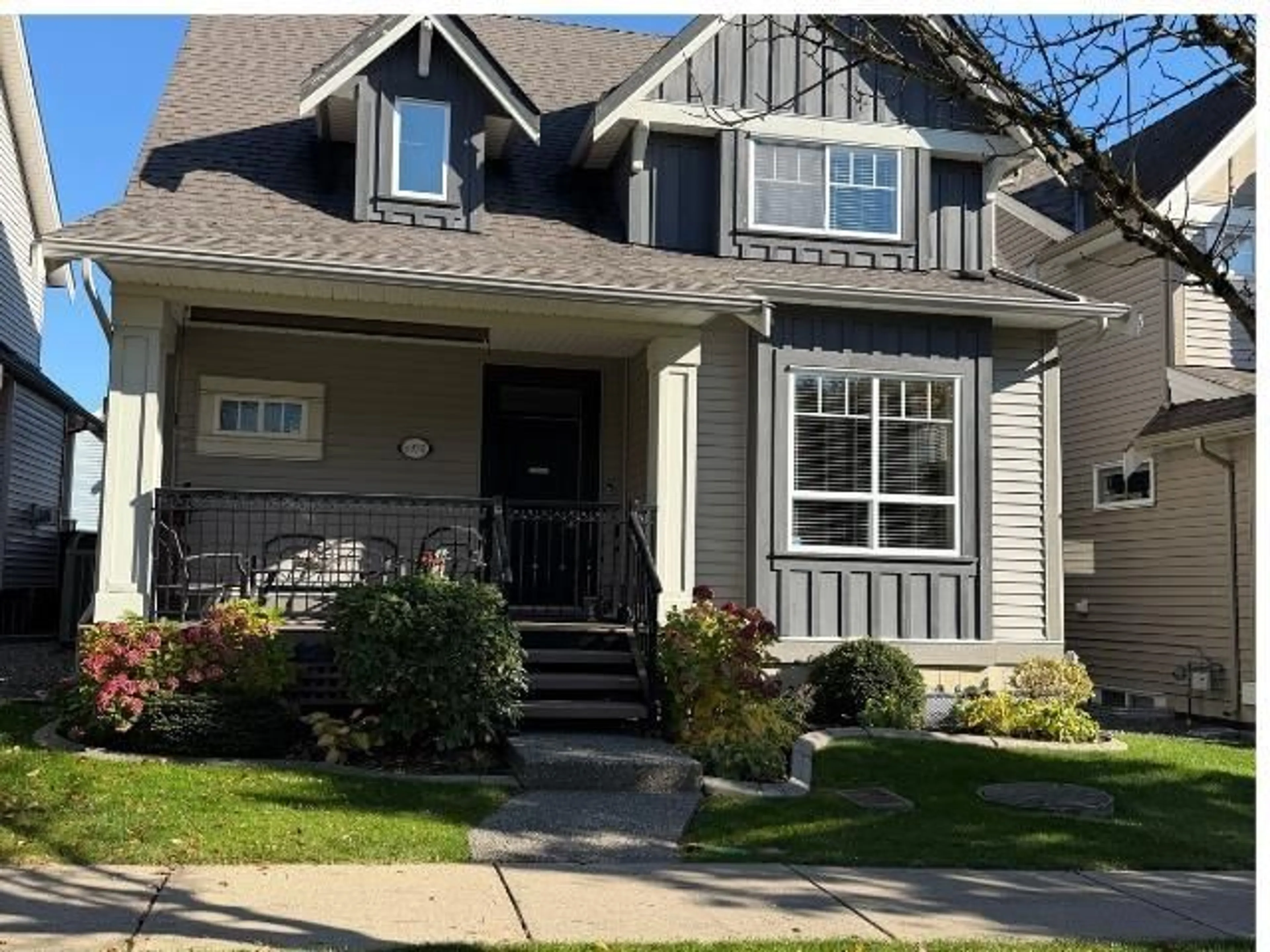 Home with vinyl exterior material, street for 6970 195A STREET, Surrey British Columbia V4N5Z2