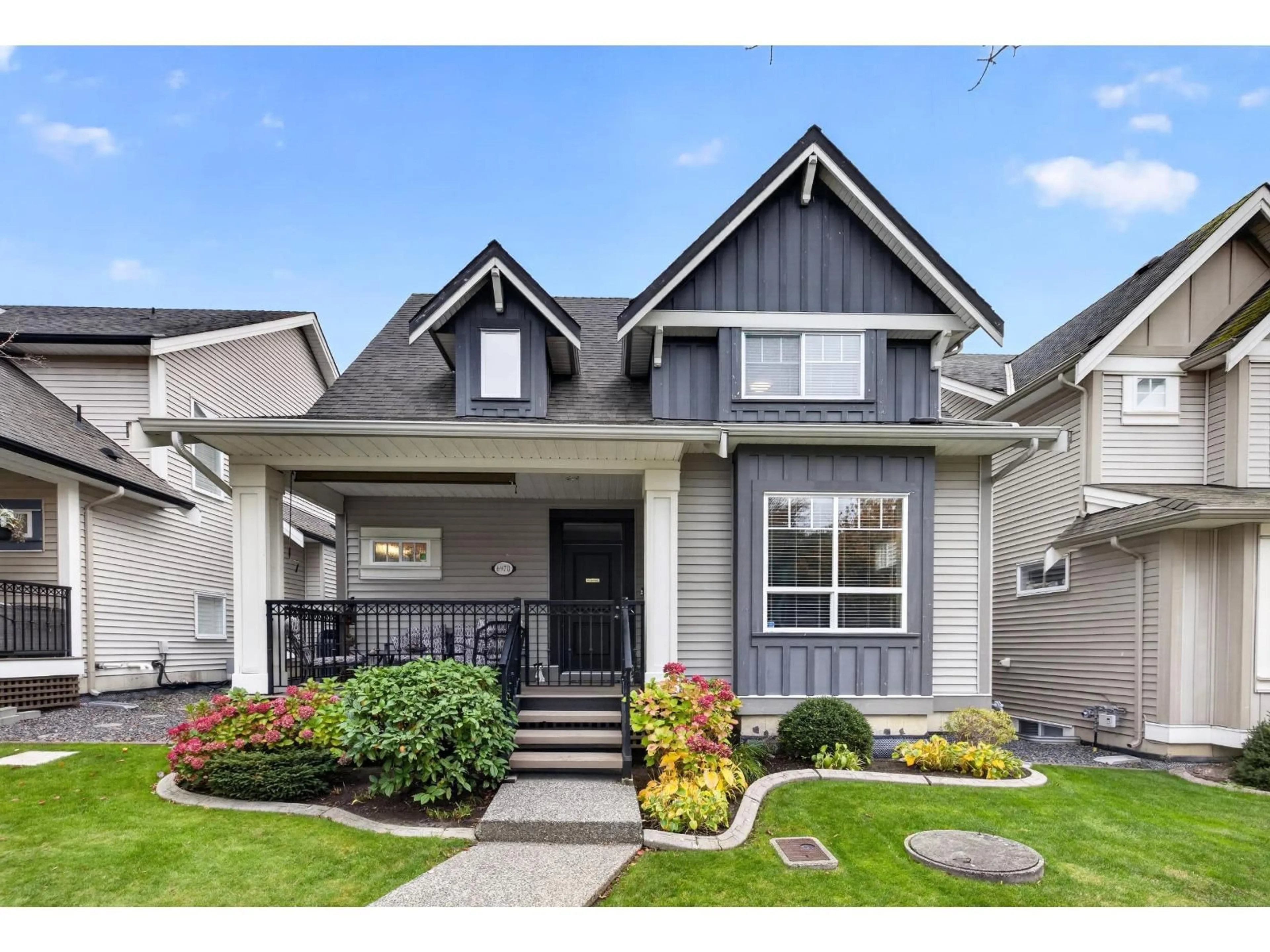 Home with vinyl exterior material, street for 6970 195A STREET, Surrey British Columbia V4N5Z2