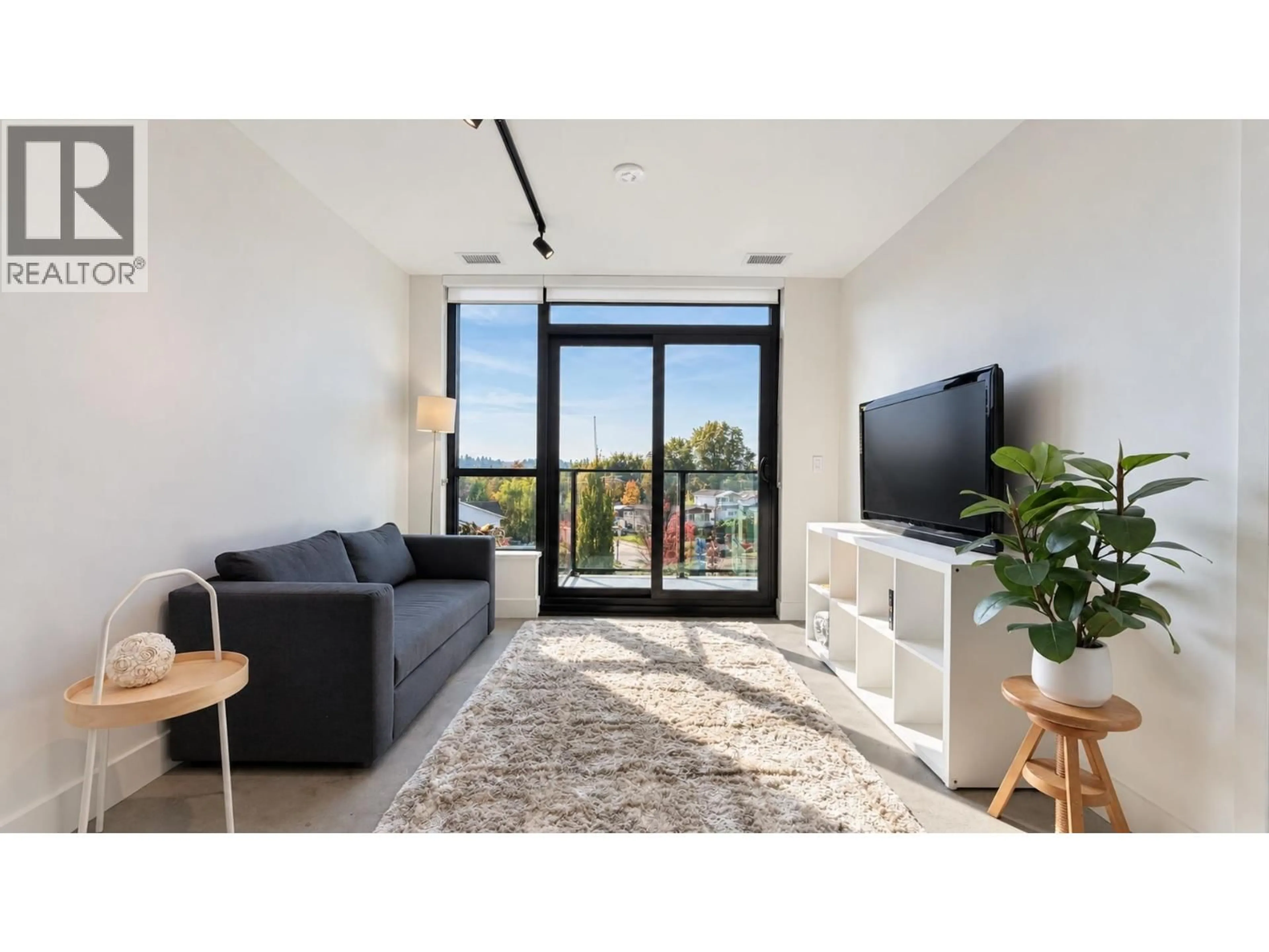 Living room with furniture, unknown for 406 - 3996 DUMFRIES STREET, Vancouver British Columbia V5N0J1