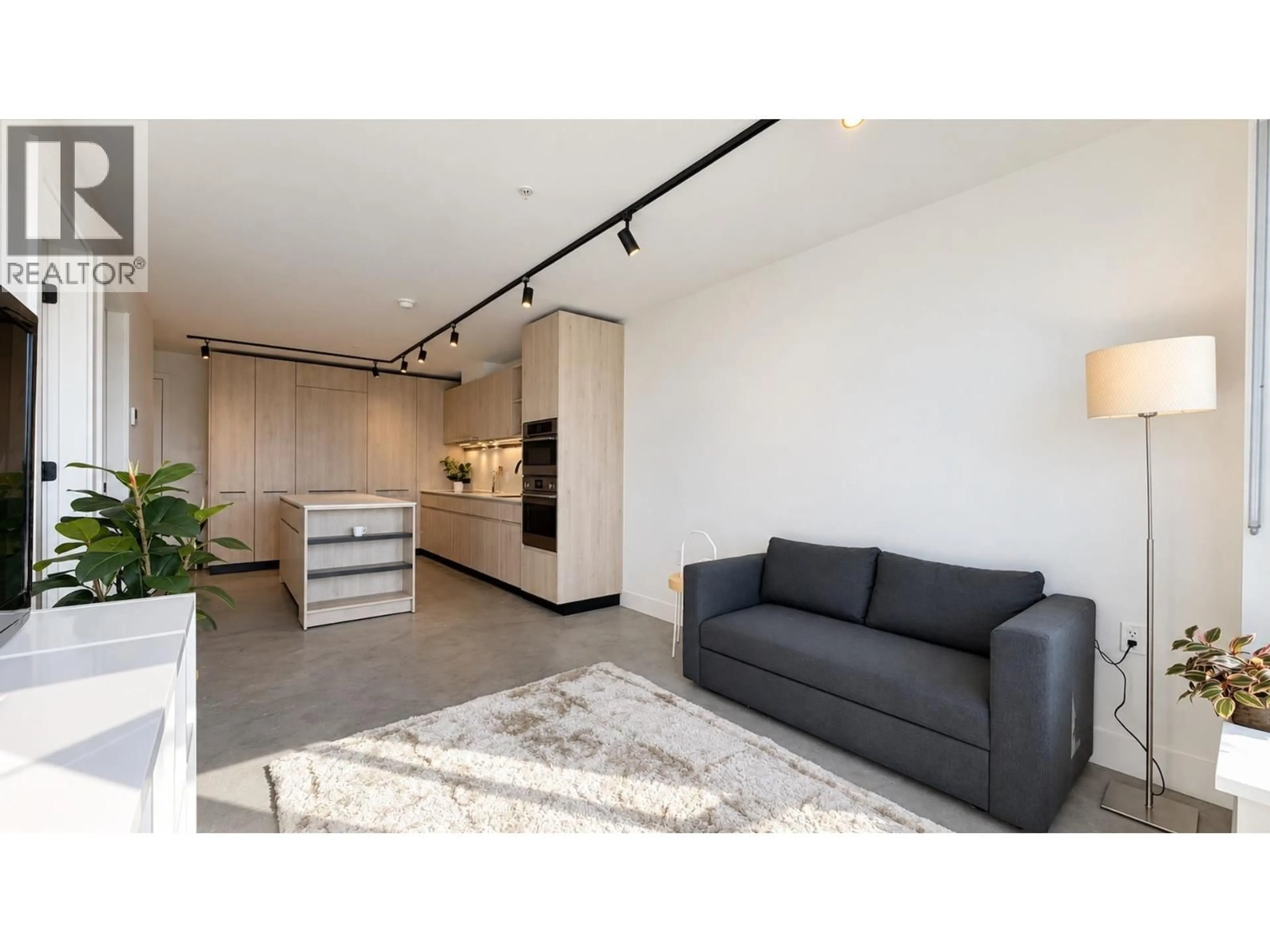 Living room with furniture, unknown for 406 - 3996 DUMFRIES STREET, Vancouver British Columbia V5N0J1