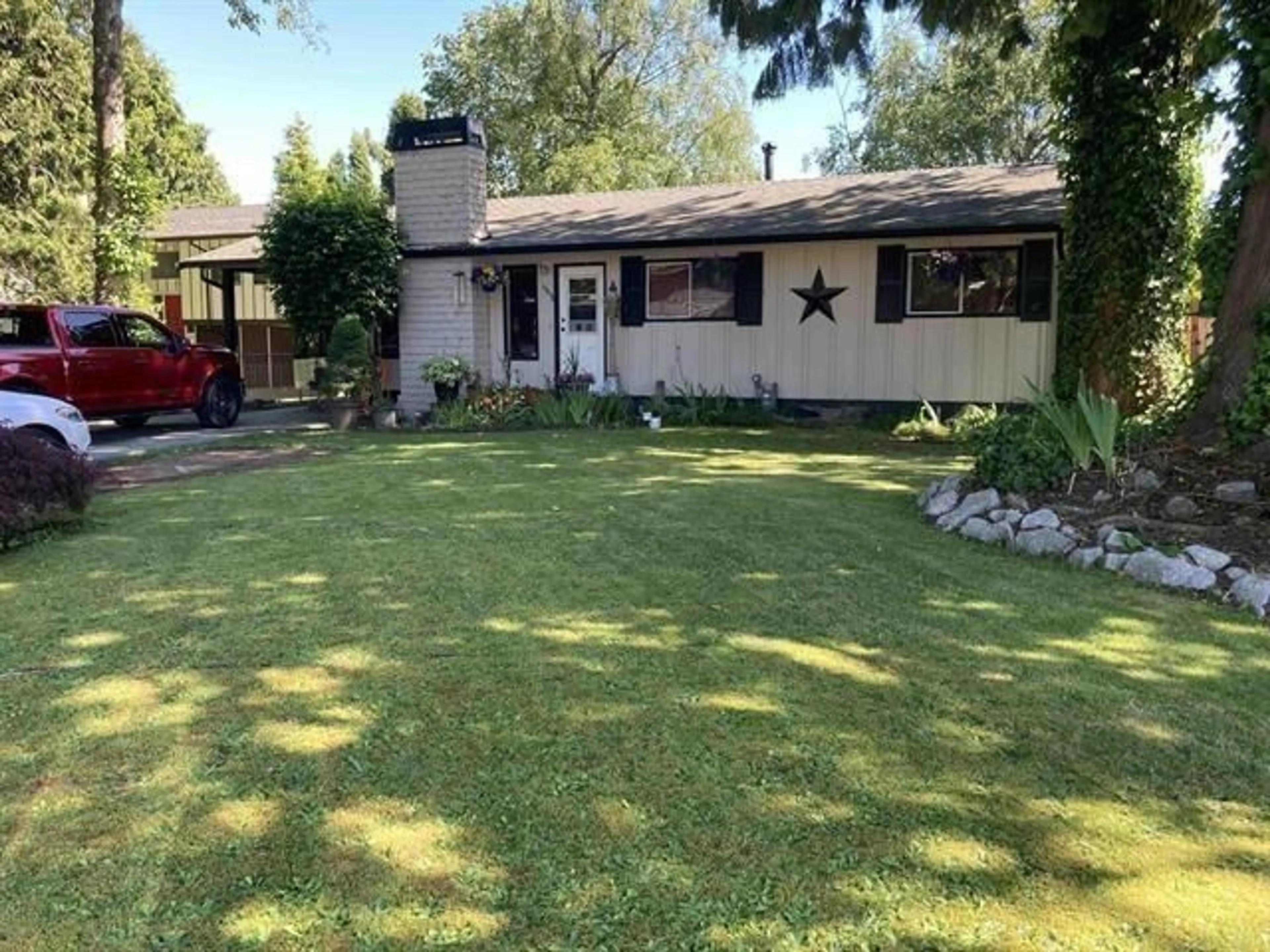 A pic from outside/outdoor area/front of a property/back of a property/a pic from drone, street for 19848 54 AVENUE, Langley British Columbia V3A3V9
