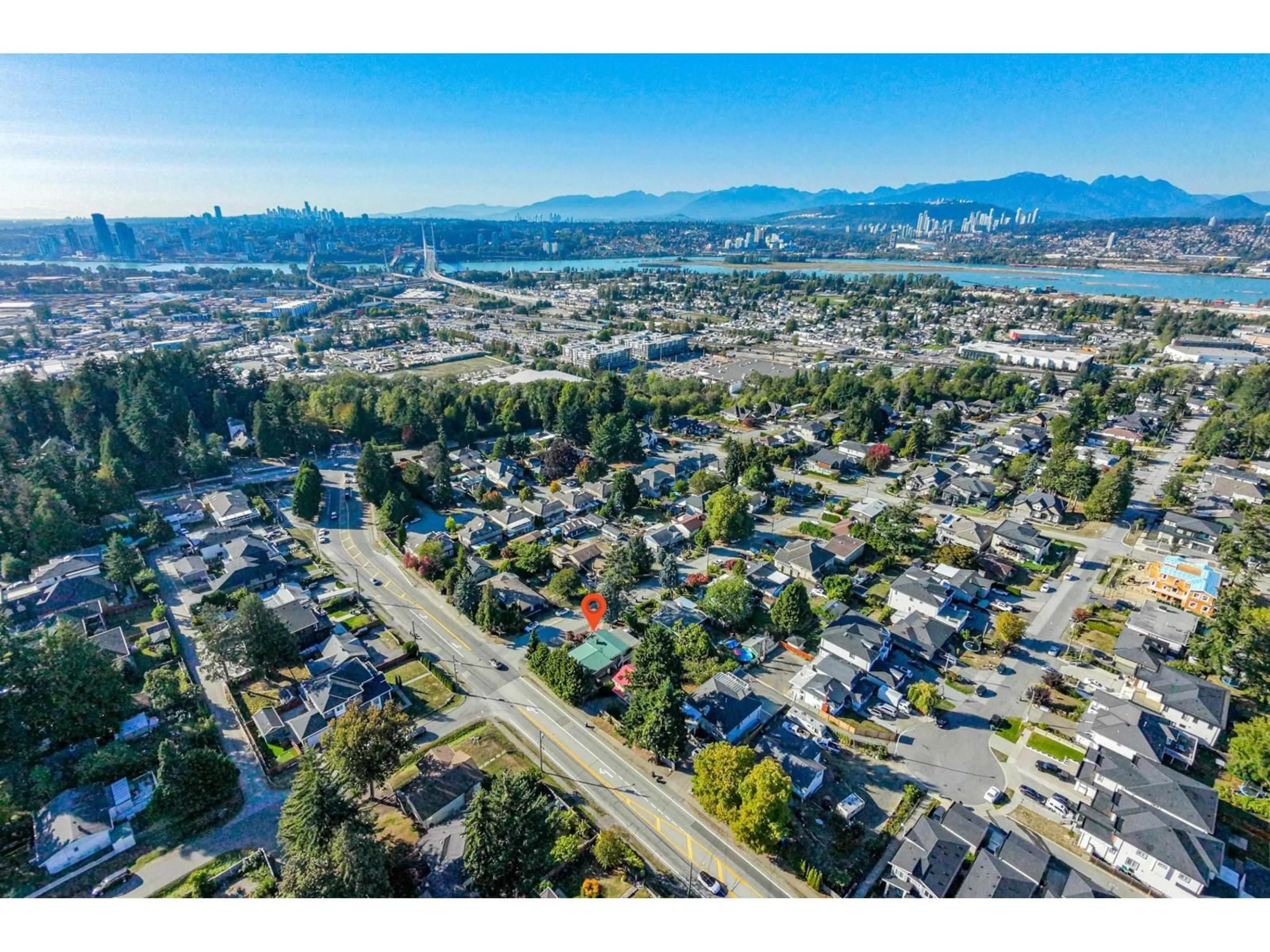 A pic from outside/outdoor area/front of a property/back of a property/a pic from drone, street for 10810 129 STREET, Surrey British Columbia V3T3H8