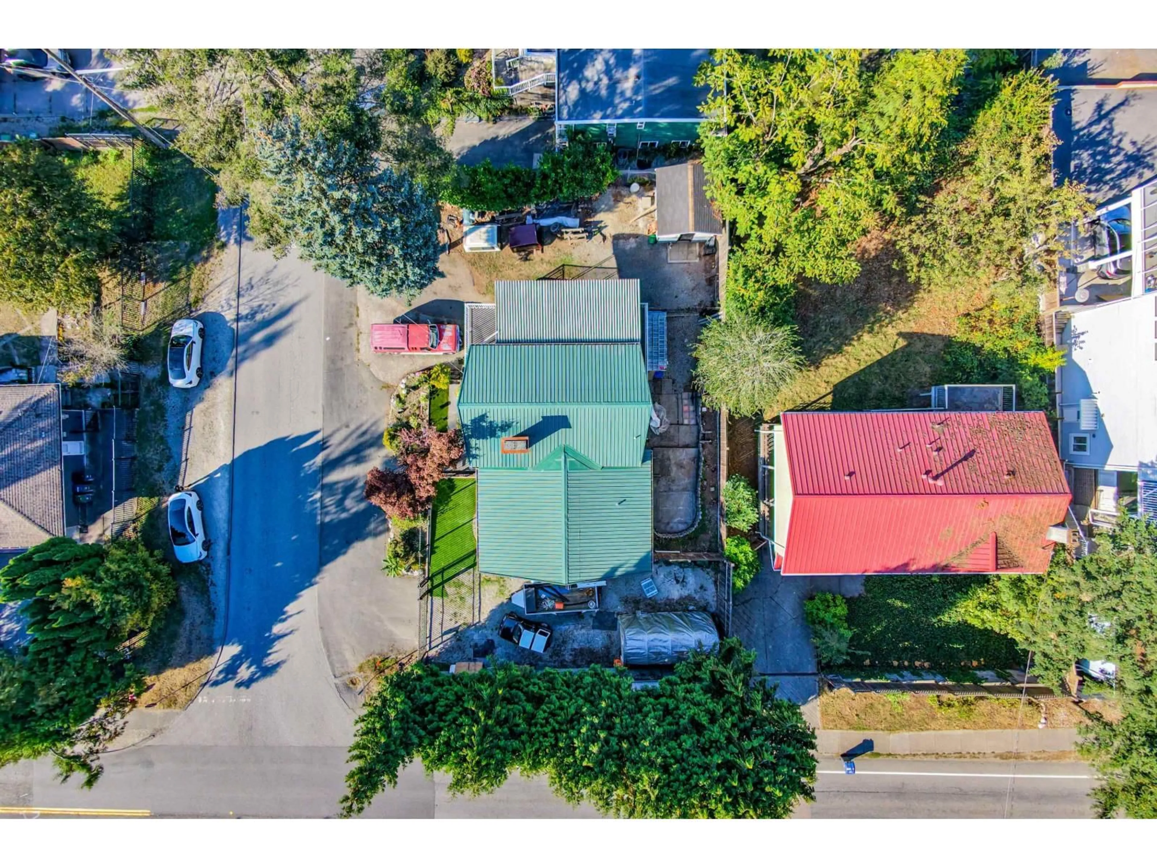 A pic from outside/outdoor area/front of a property/back of a property/a pic from drone, street for 10810 129 STREET, Surrey British Columbia V3T3H8