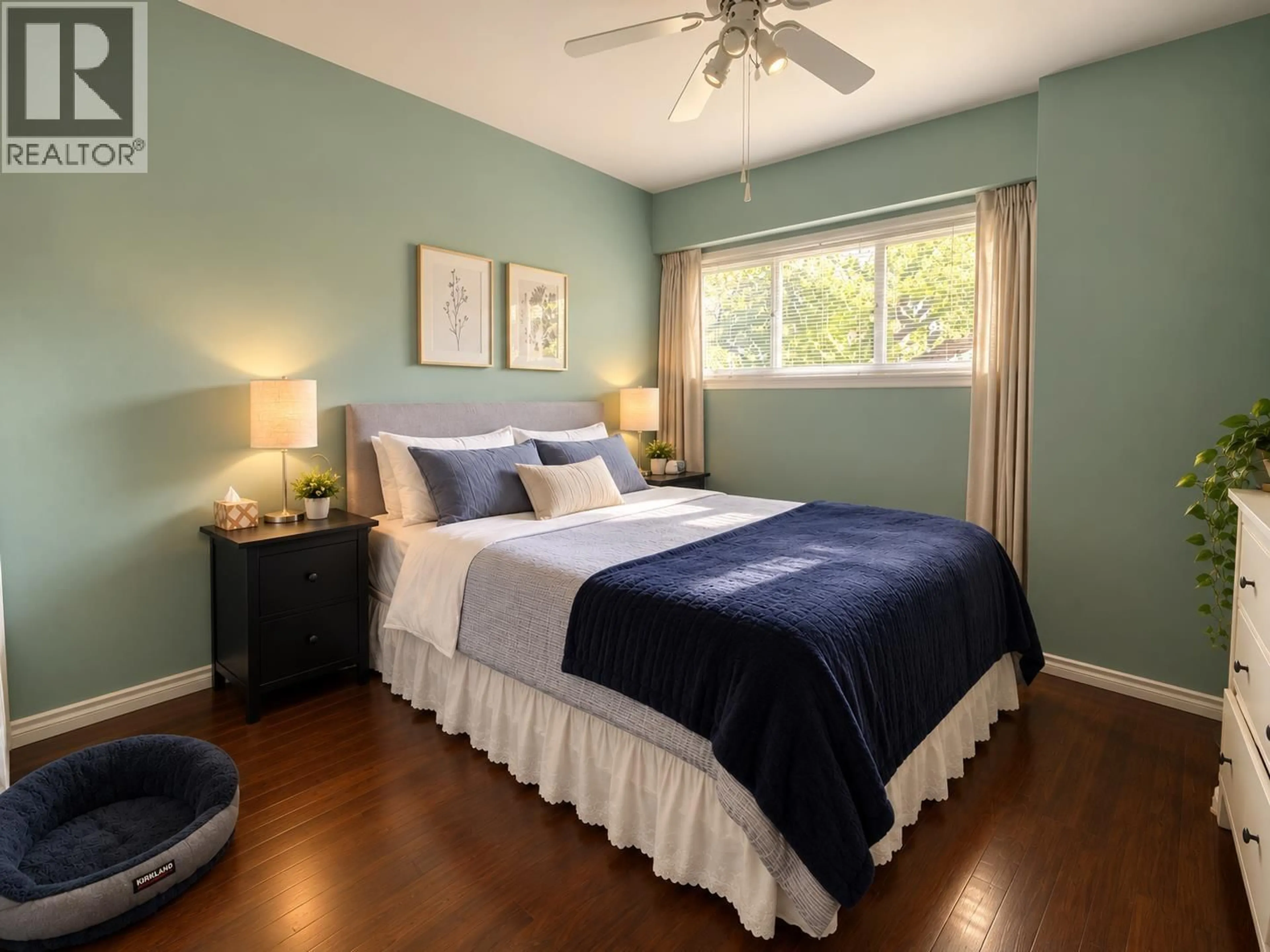 Bedroom with bed, wood/laminate floor for 4676 COMMERCIAL STREET, Vancouver British Columbia V5N4G6