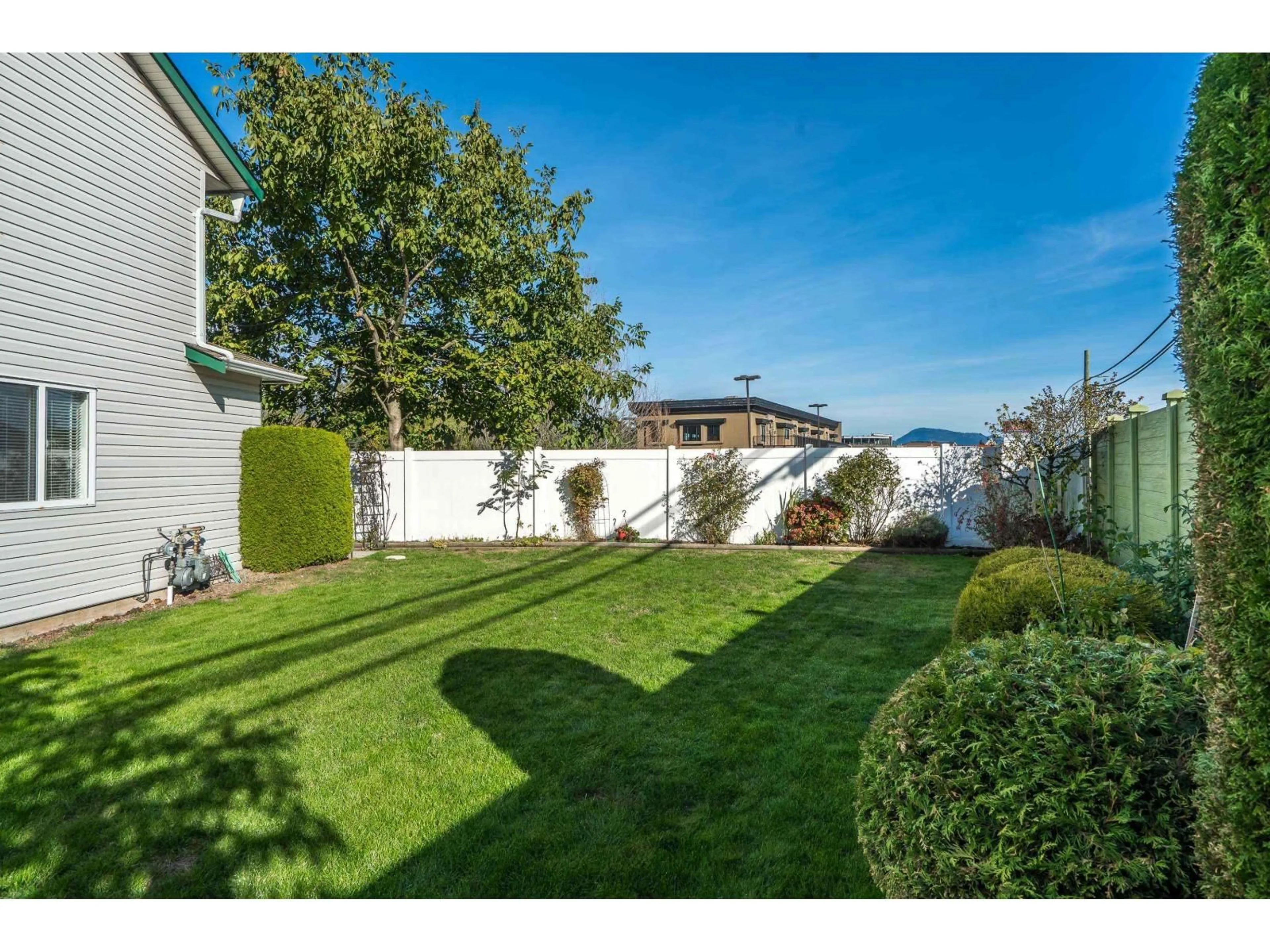 A pic from outside/outdoor area/front of a property/back of a property/a pic from drone, street for 101 - 5765 VEDDER ROAD, Chilliwack British Columbia V2R1C3