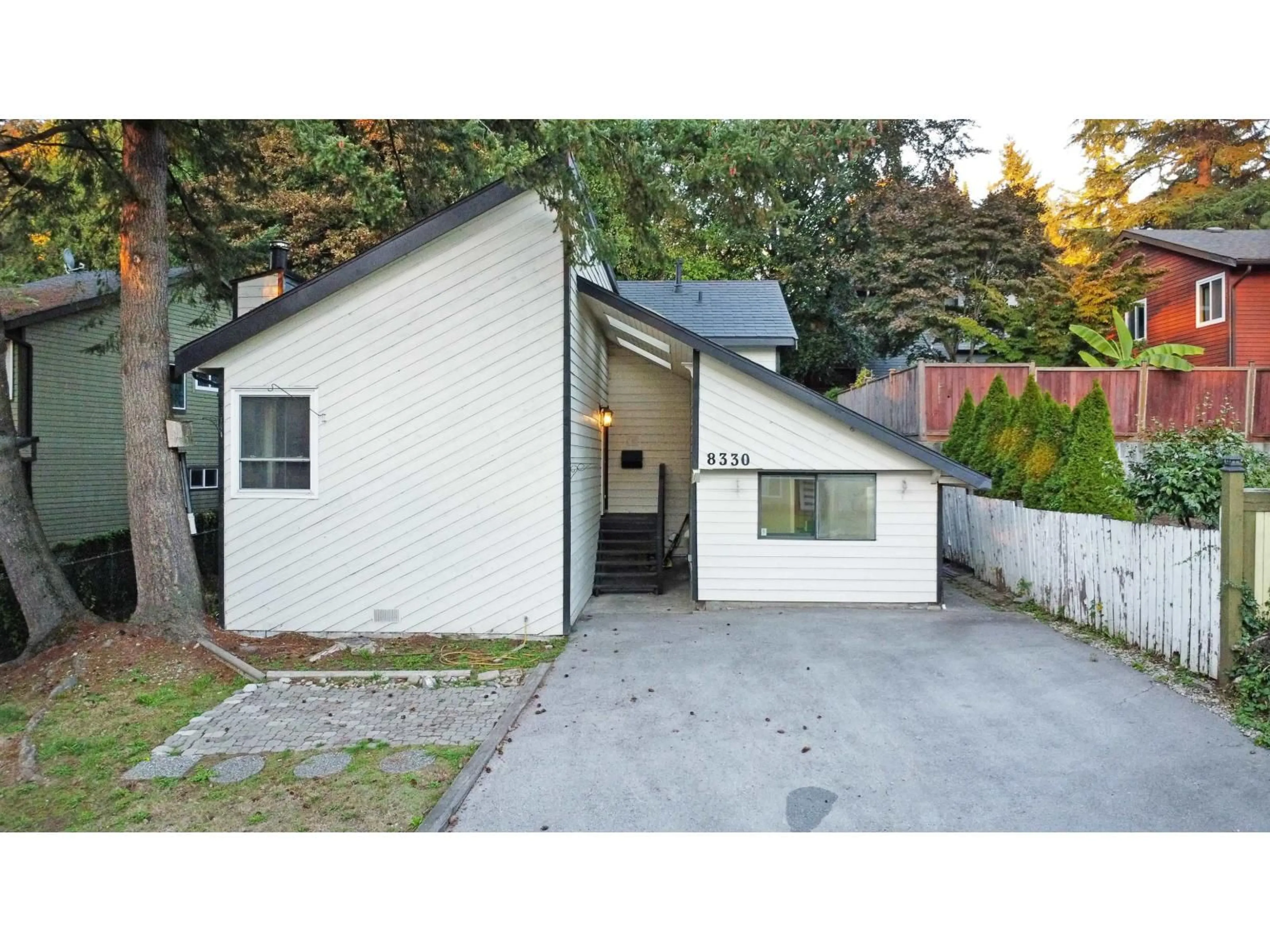 Home with vinyl exterior material, street for 8330 SHEAVES ROAD, Delta British Columbia V4C3X1