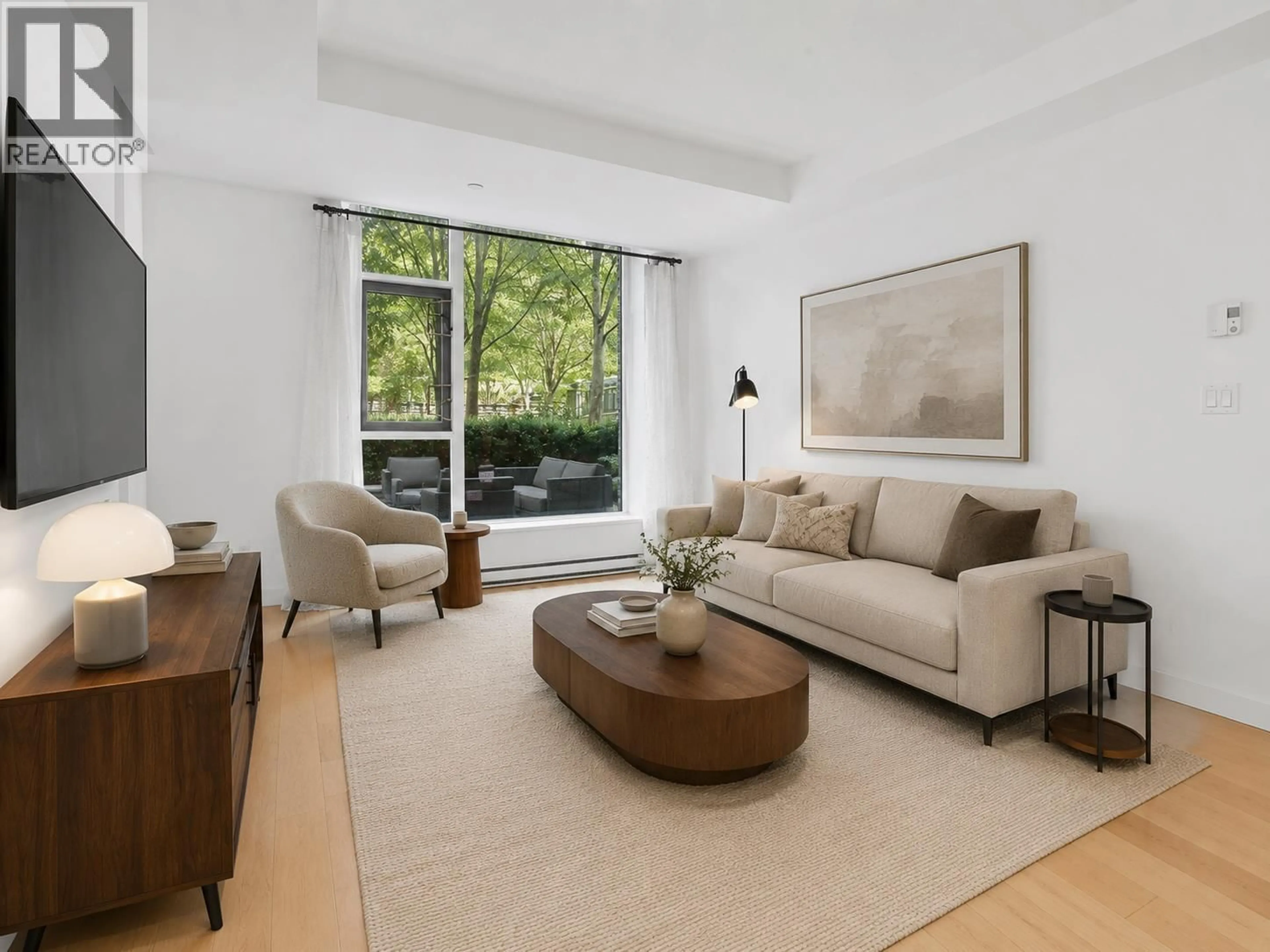 Living room with furniture, unknown for 105 - 5868 AGRONOMY ROAD, Vancouver British Columbia V6T0B5