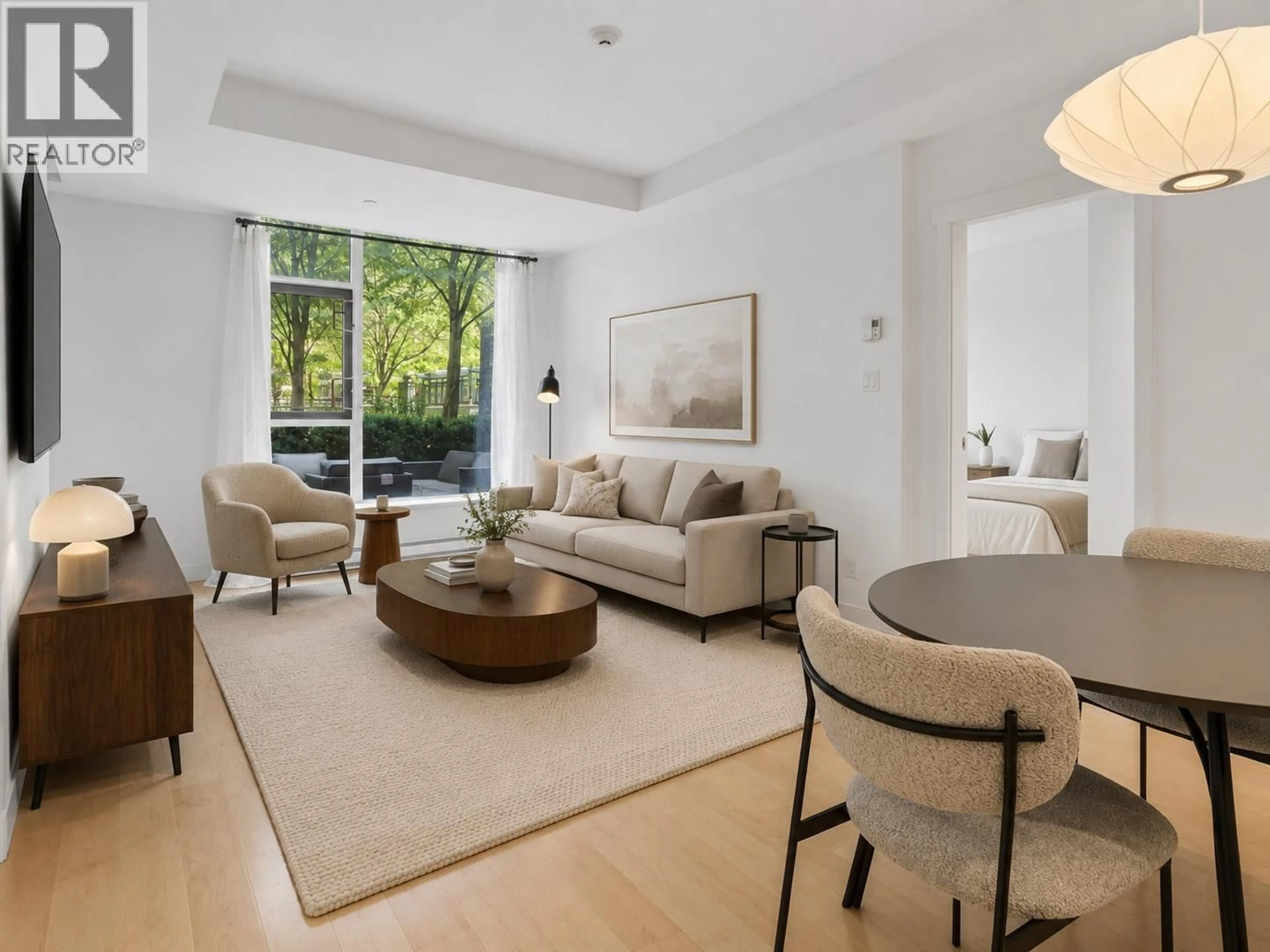 Living room with furniture, unknown for 105 - 5868 AGRONOMY ROAD, Vancouver British Columbia V6T0B5