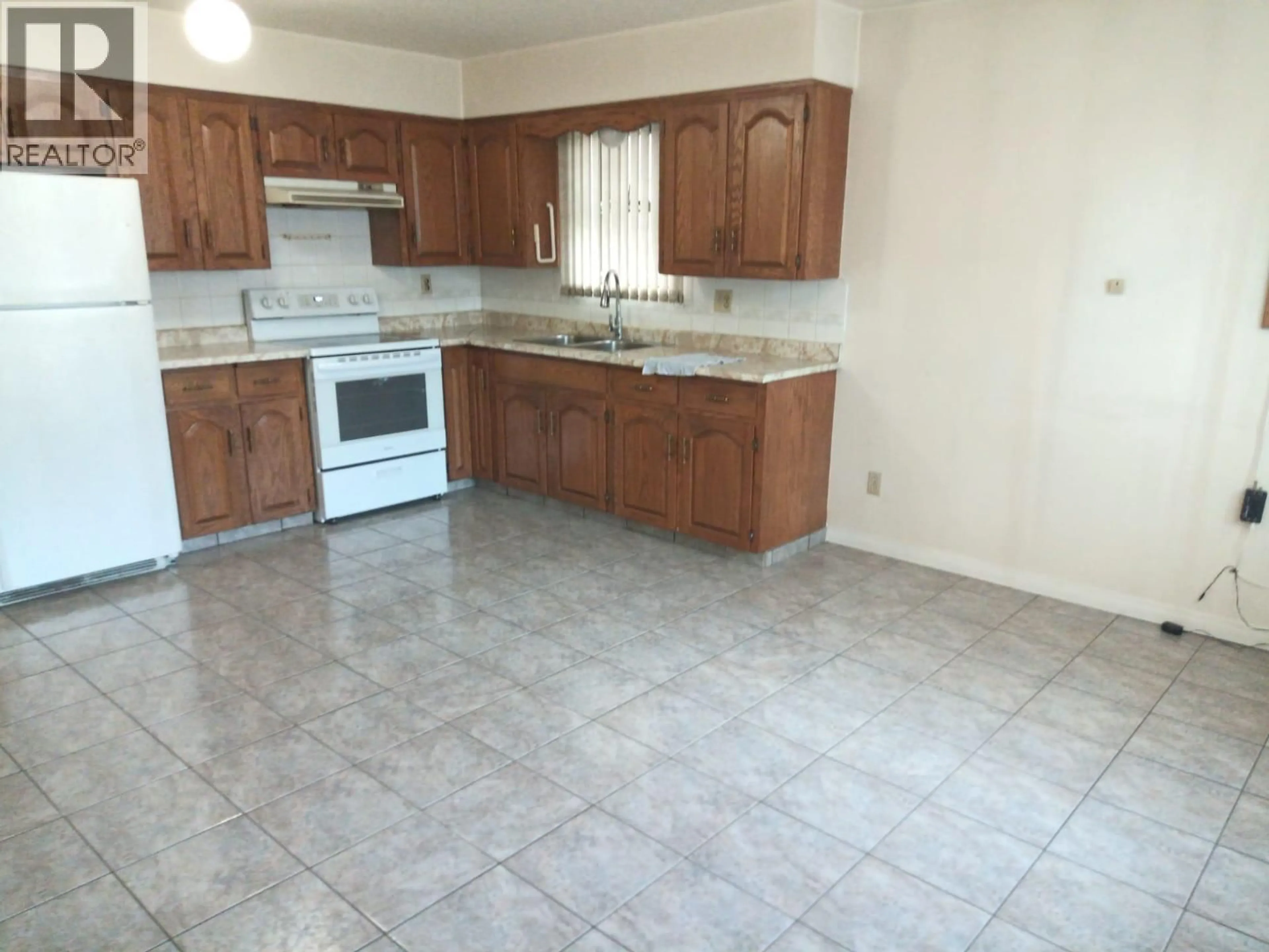 Standard kitchen, ceramic/tile floor for 2086 49TH AVENUE, Vancouver British Columbia V5P1T7