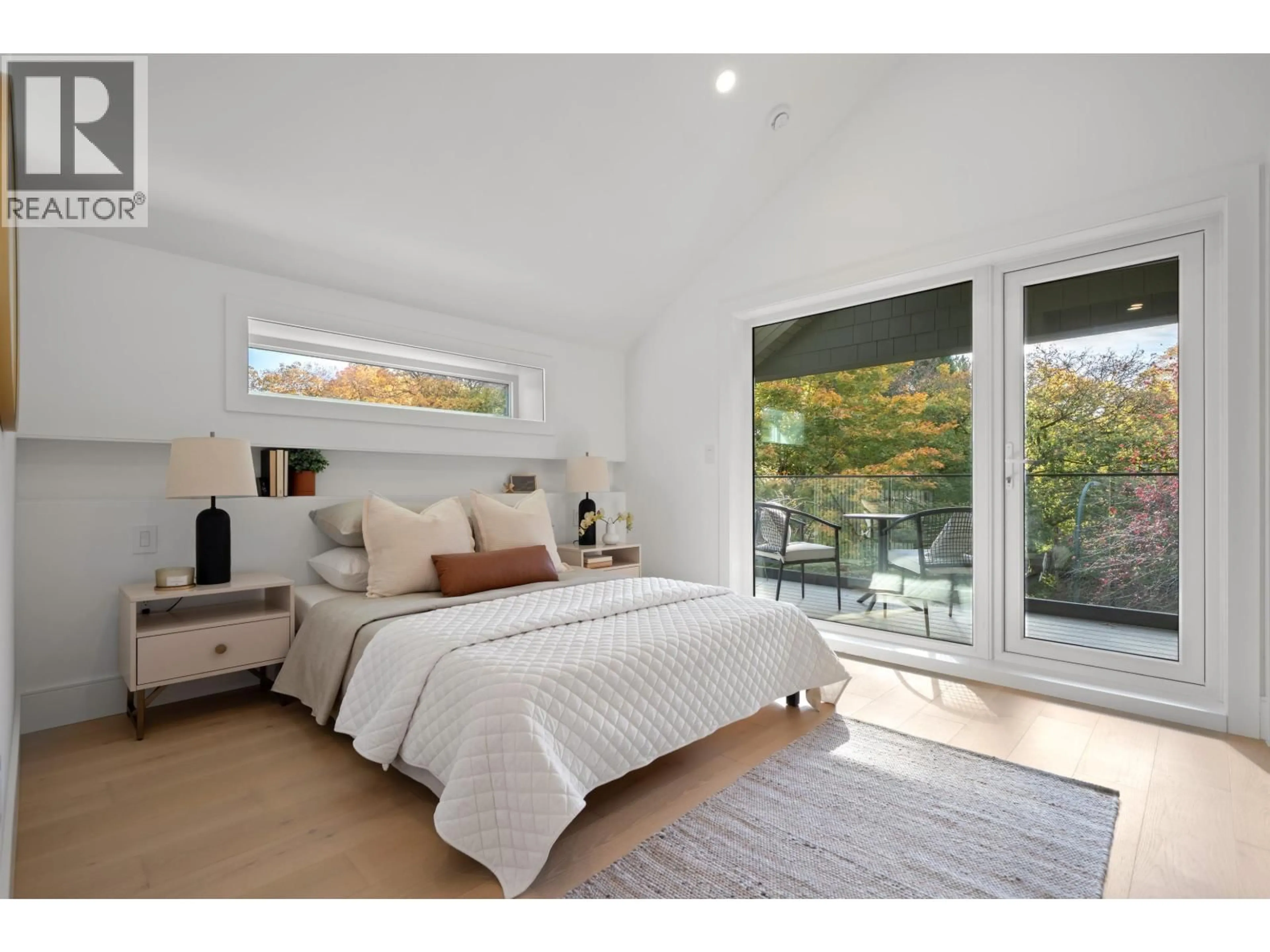 Bedroom with bed, wood/laminate floor for 1 - 3657 11TH AVENUE, Vancouver British Columbia V6R2K4