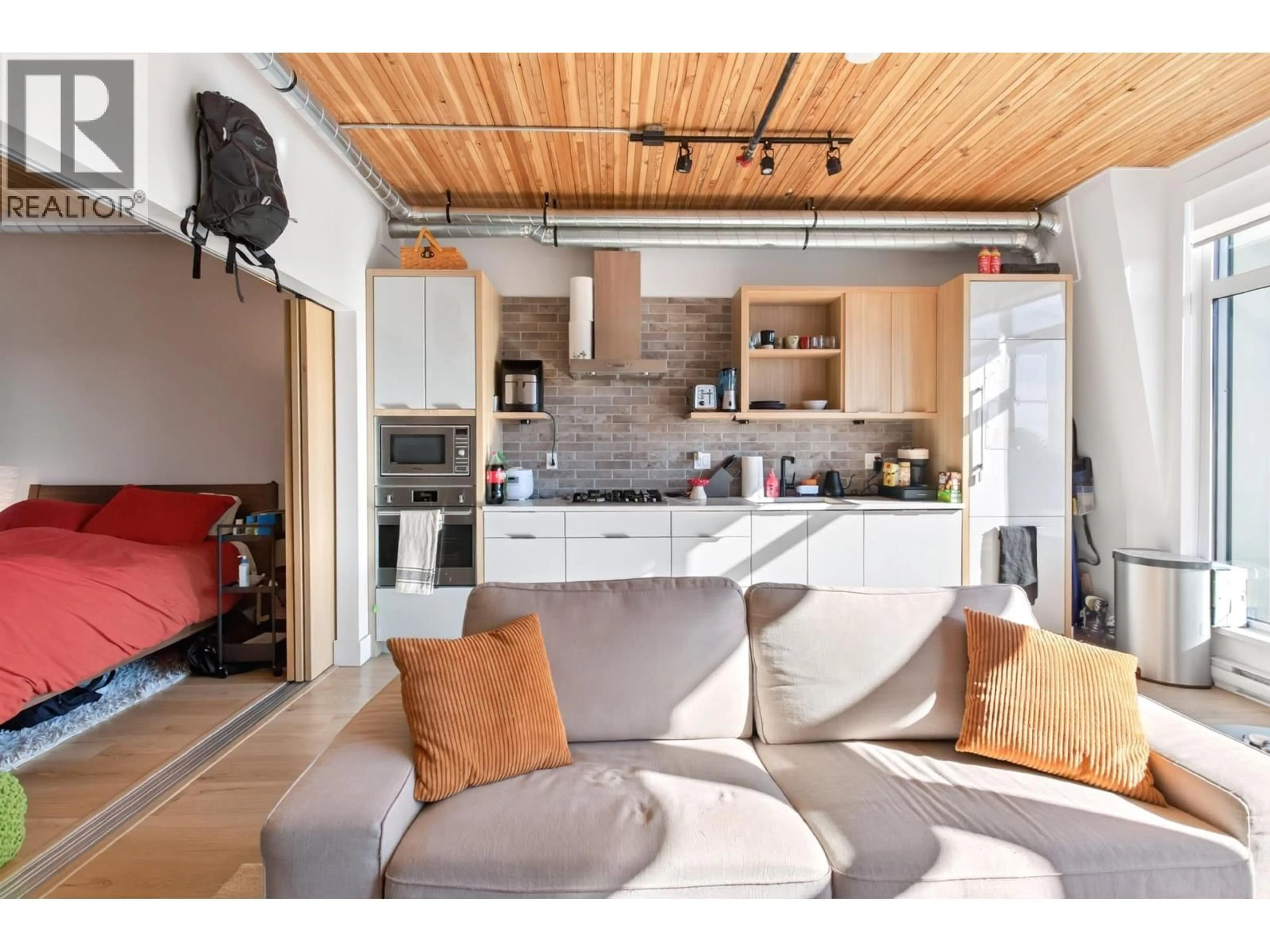 Open concept kitchen, unknown for 406 - 4223 HASTINGS STREET, Burnaby British Columbia V5C2J5