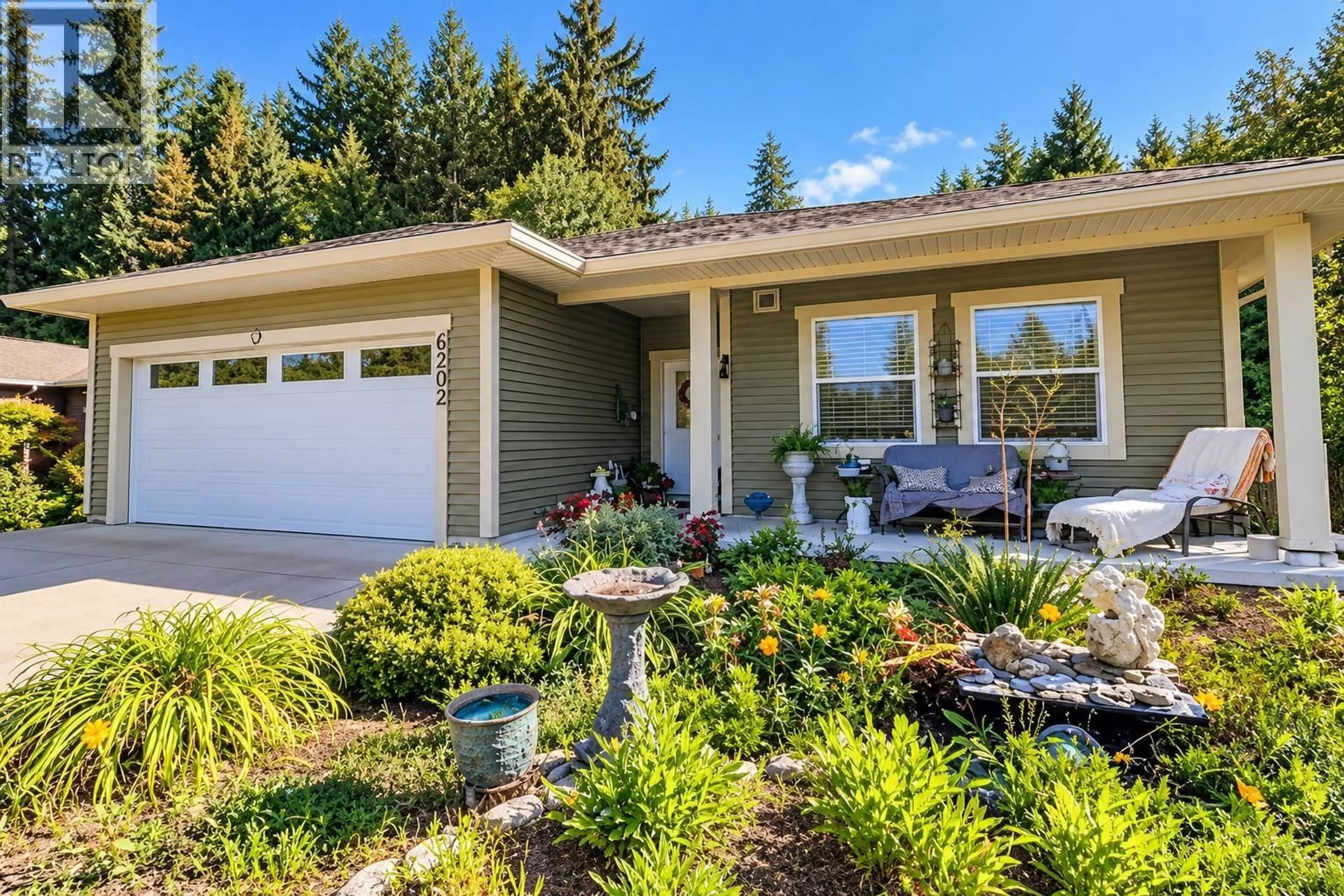 Home with vinyl exterior material, street for 6202 SITKA ROAD, Sechelt British Columbia V0N3A3