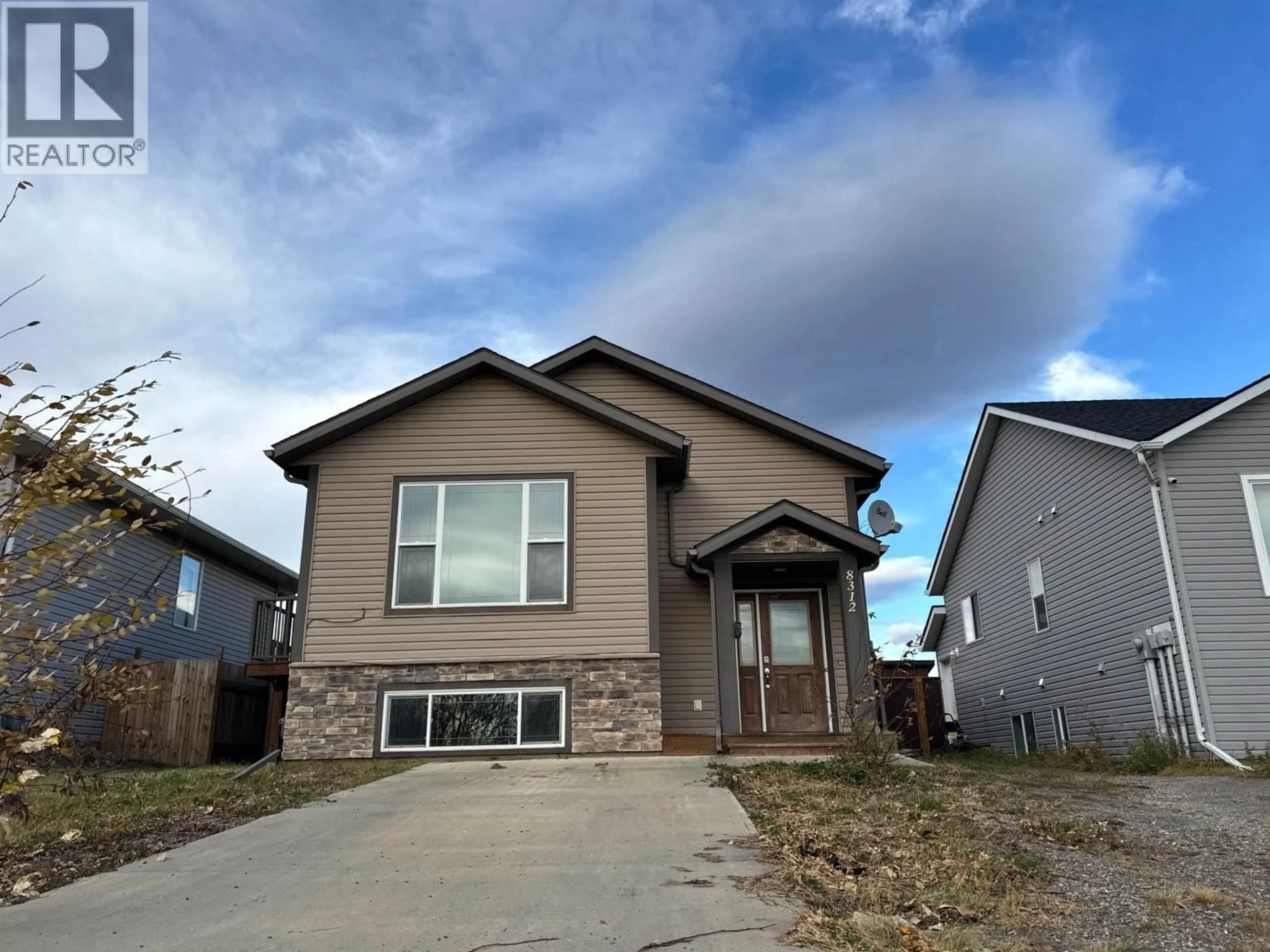 Home with vinyl exterior material, street for 8312 85 AVENUE, Fort St. John British Columbia V1J0G3