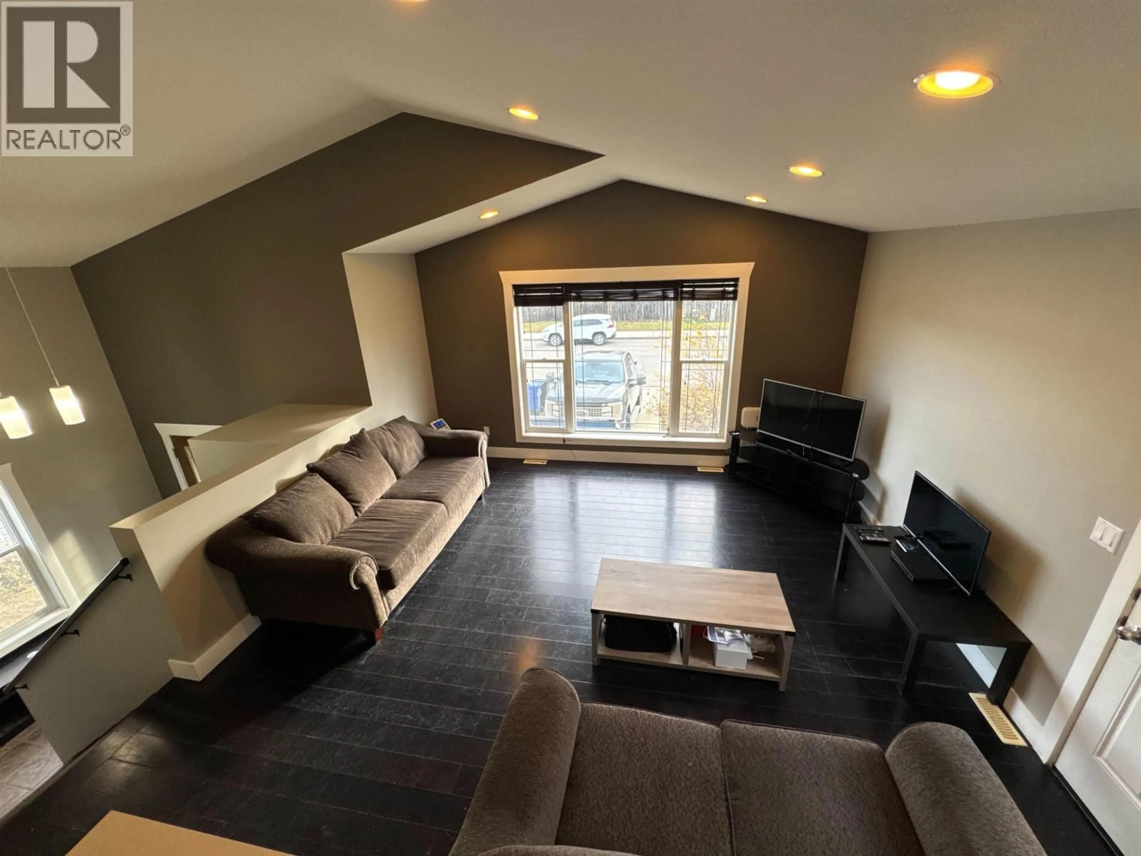 Living room with furniture, unknown for 8312 85 AVENUE, Fort St. John British Columbia V1J0G3