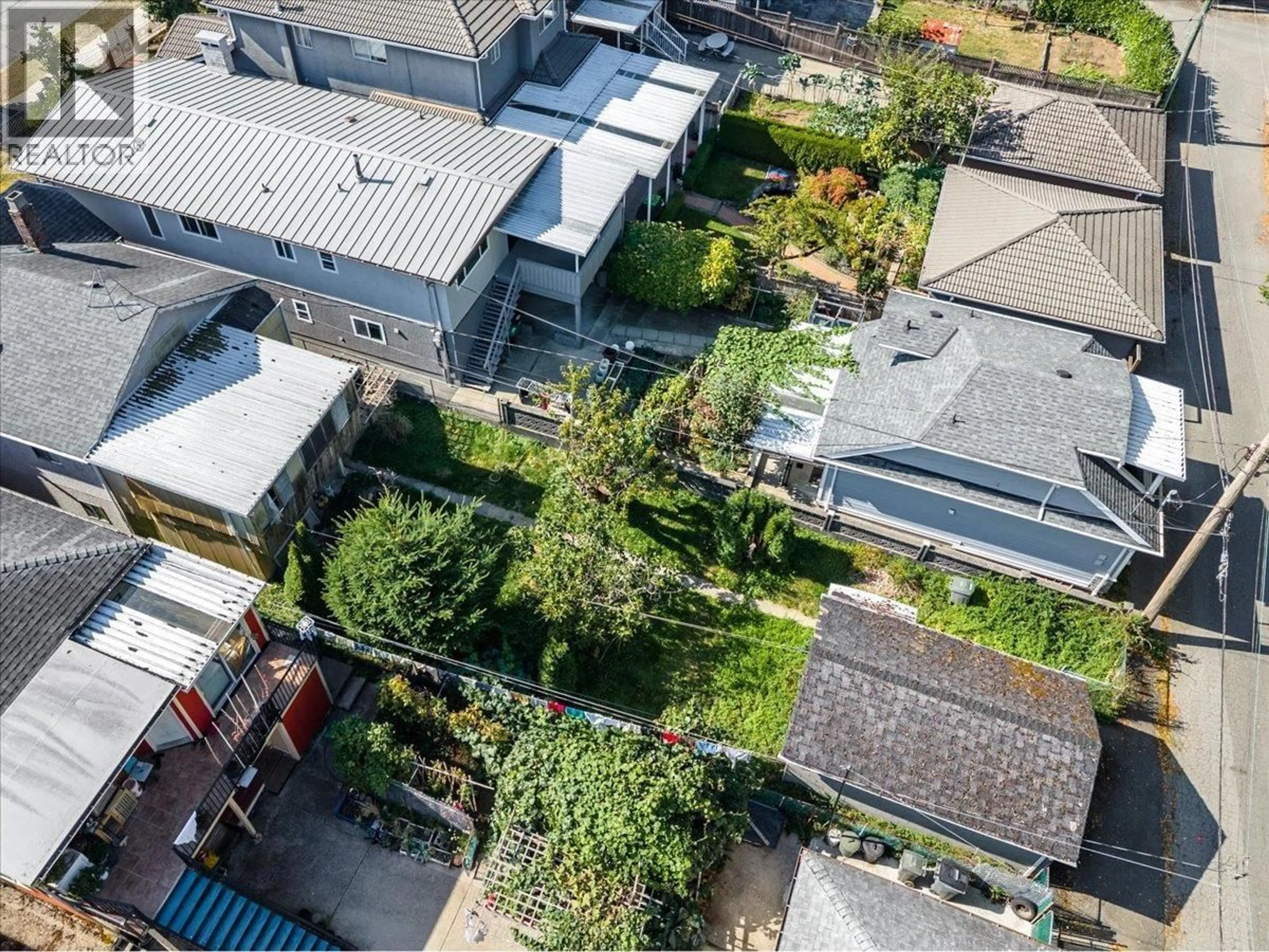 A pic from outside/outdoor area/front of a property/back of a property/a pic from drone, street for 2741 EUCLID AVENUE, Vancouver British Columbia V5R5B8