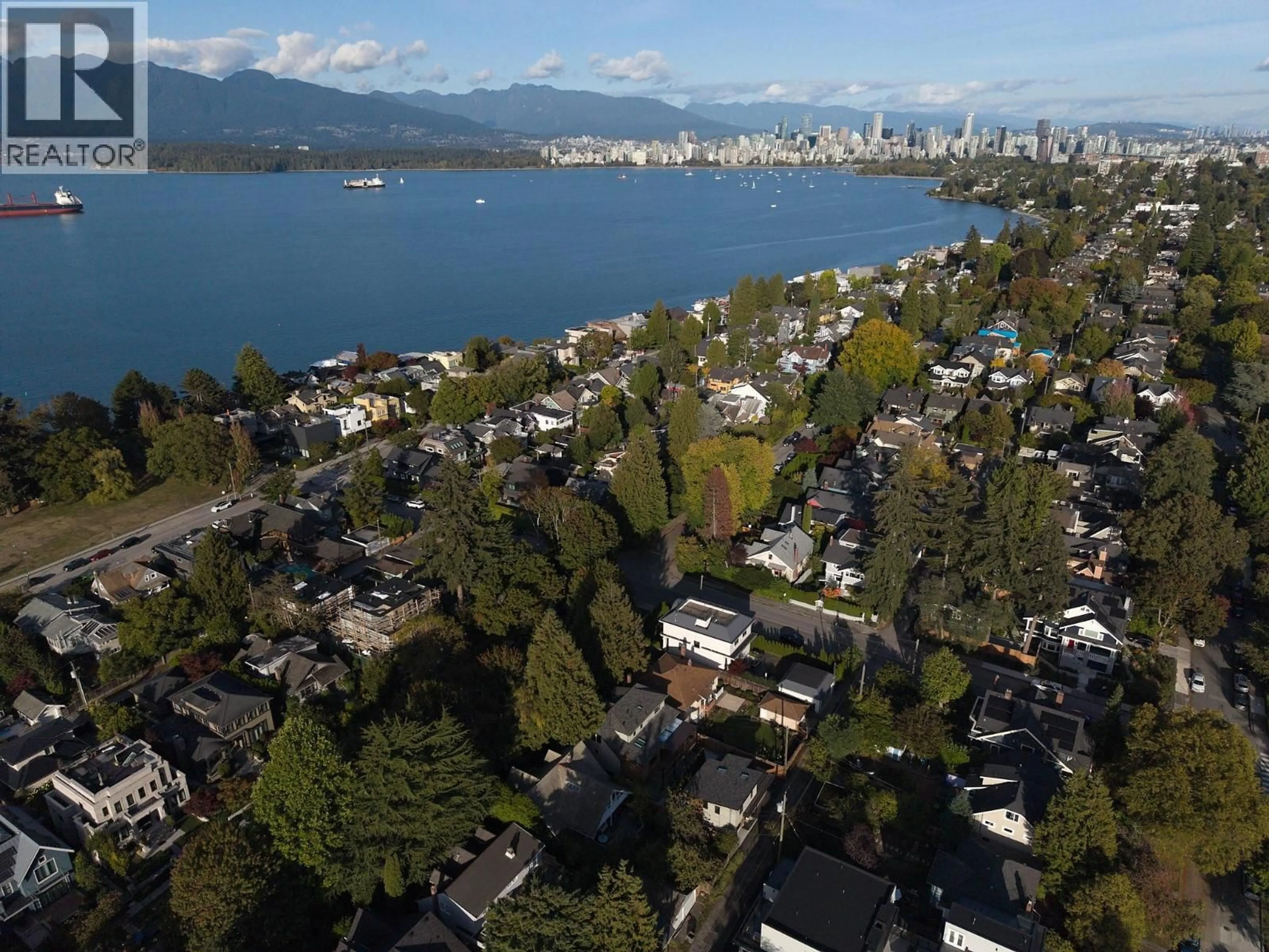 A pic from outside/outdoor area/front of a property/back of a property/a pic from drone, mountain view for 3732 1ST AVENUE, Vancouver British Columbia V6R1H4