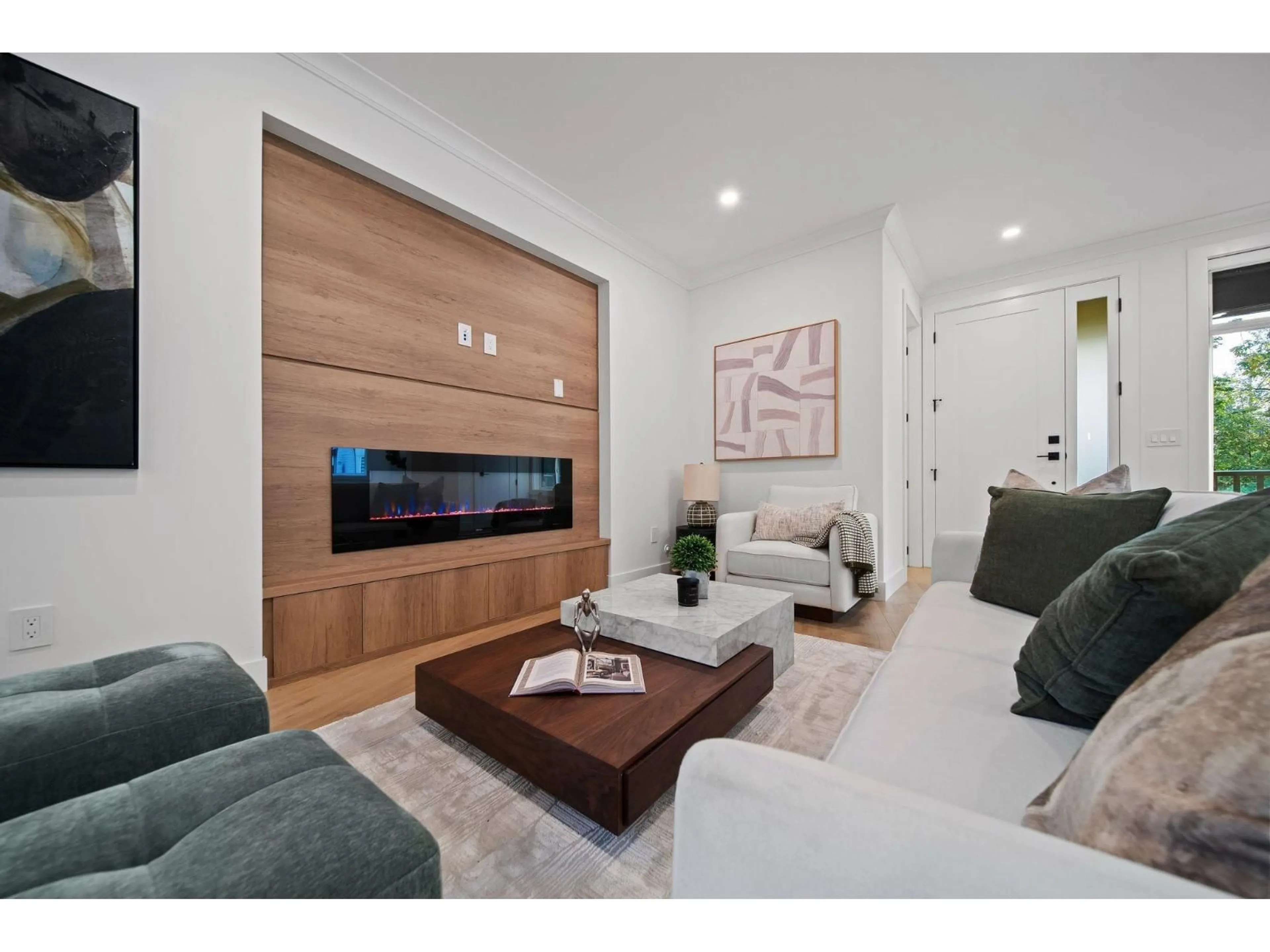 Living room with furniture, wood/laminate floor for 16615 102 AVENUE, Surrey British Columbia V4N4X2