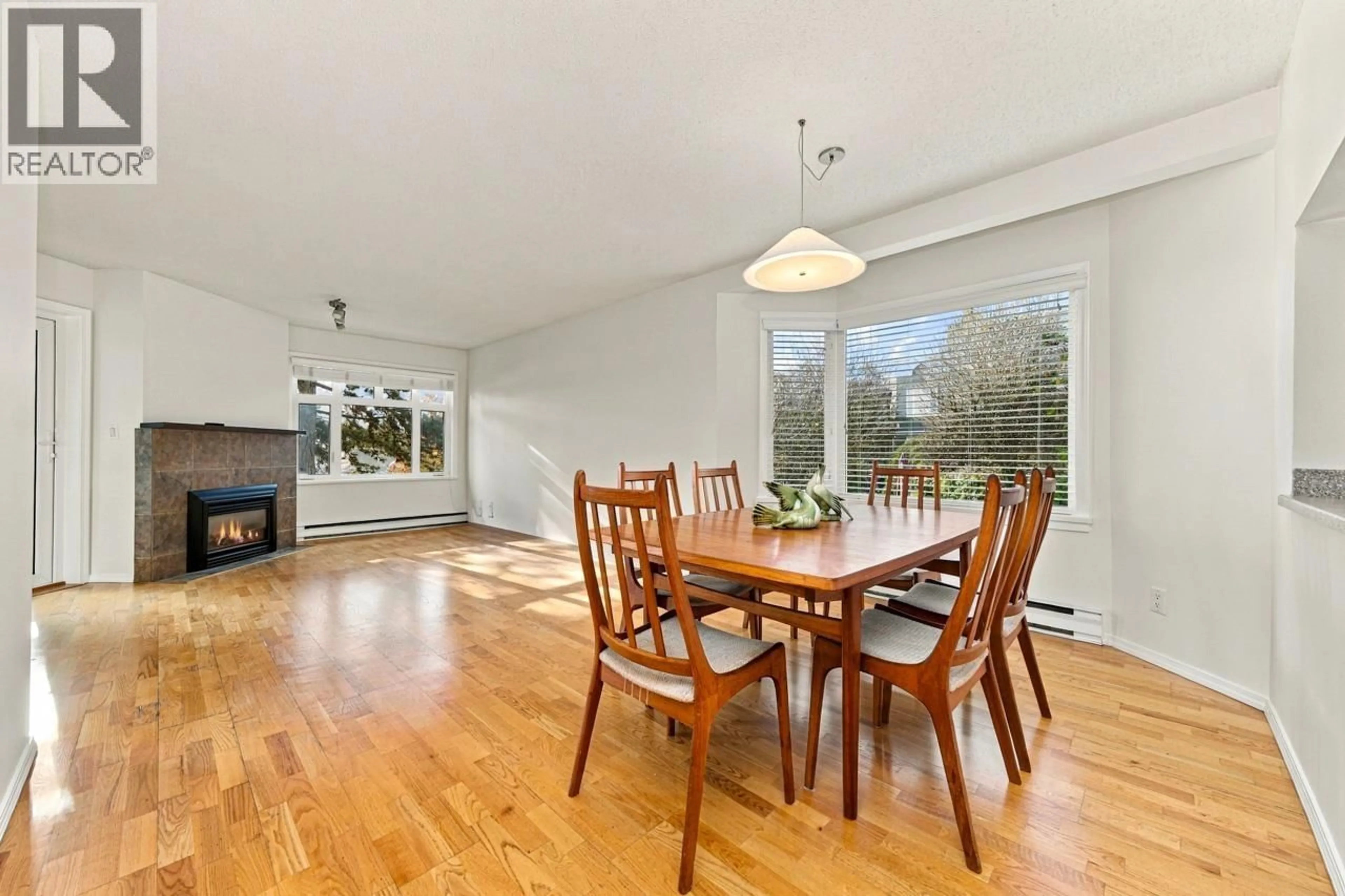 Dining room, wood/laminate floor for 214 - 121 29 STREET, North Vancouver British Columbia V7N4L6