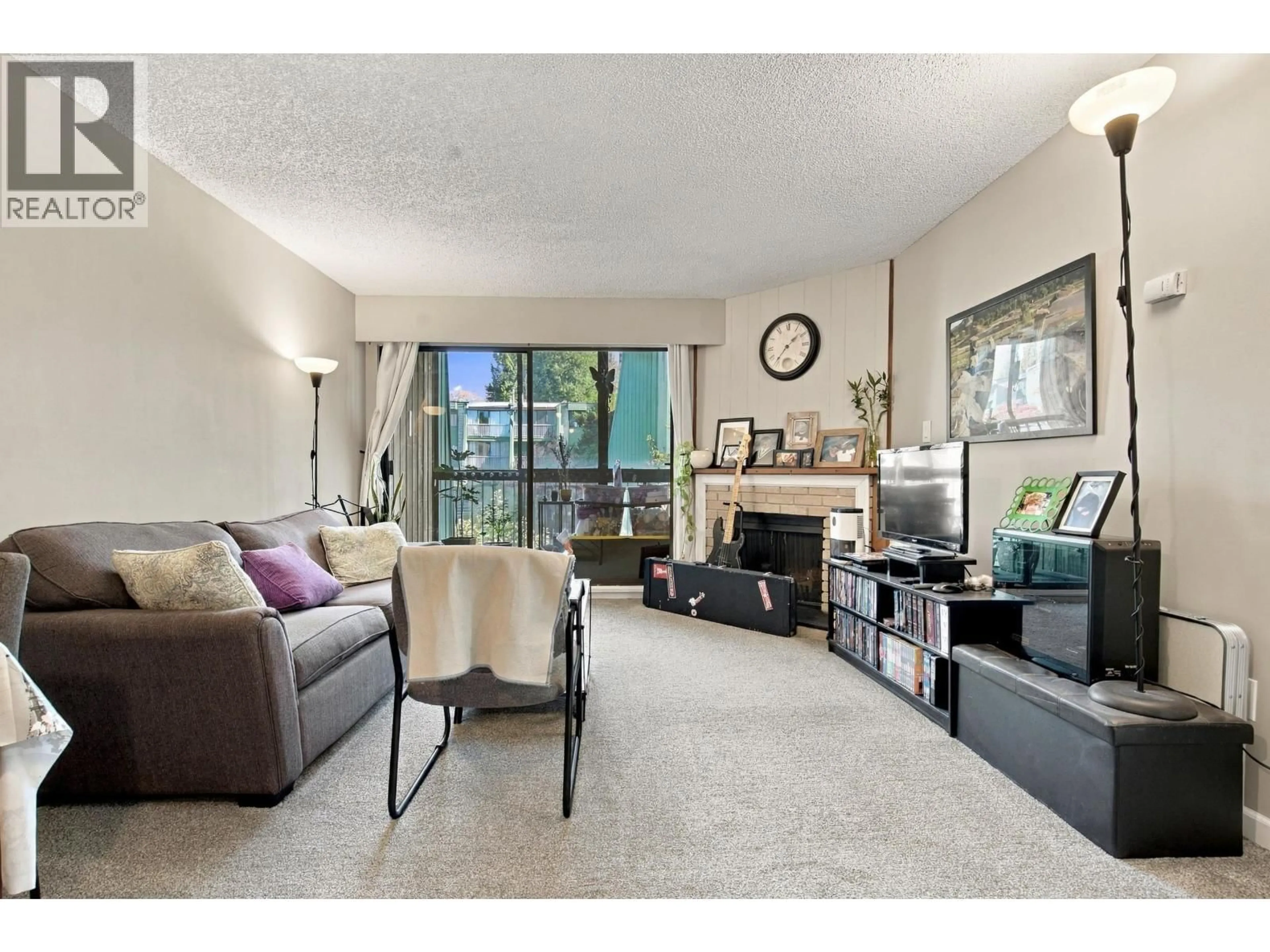 Living room with furniture, unknown for 210 - 9202 HORNE STREET, Burnaby British Columbia V3N4K2