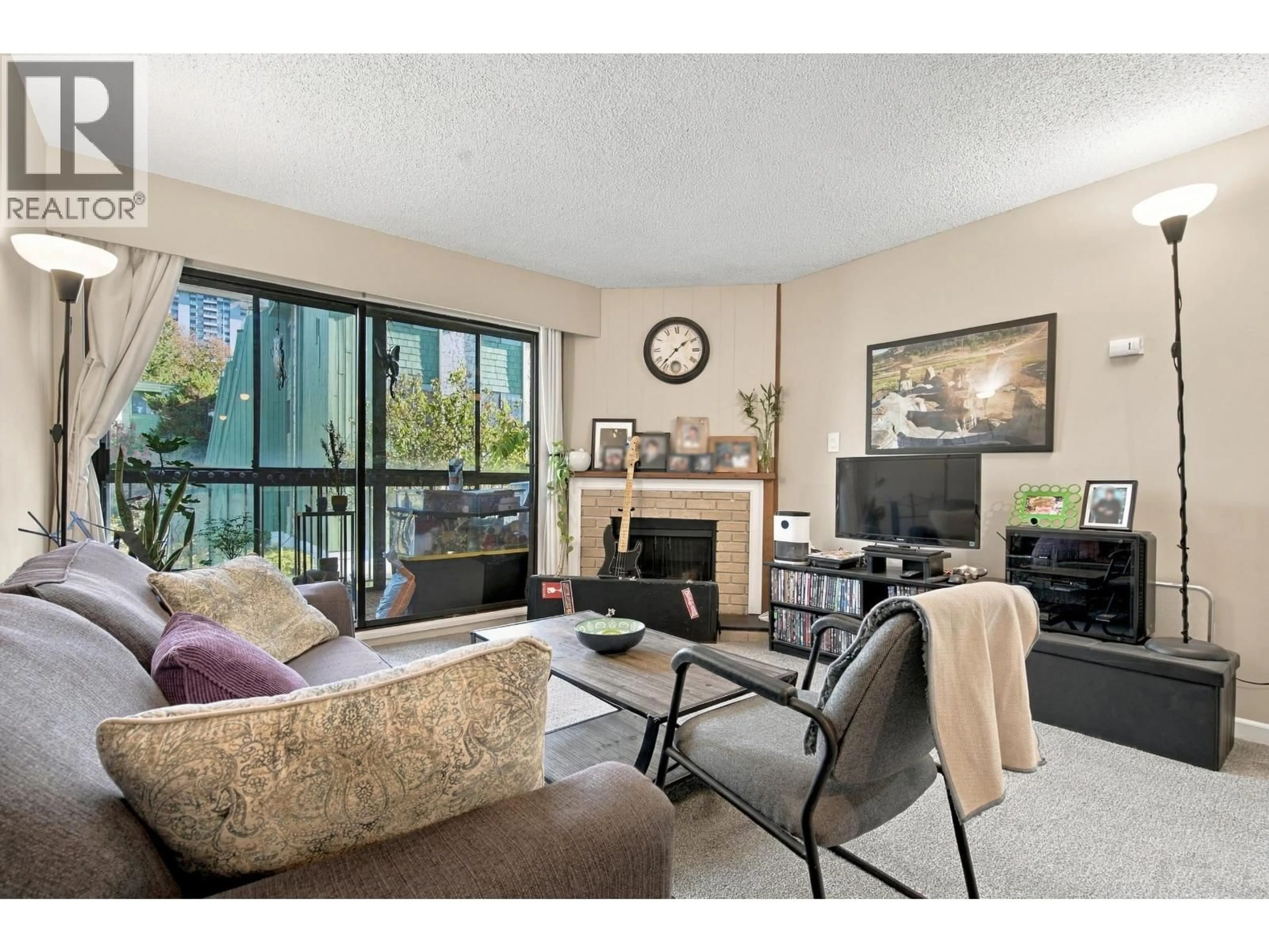 Living room with furniture, unknown for 210 - 9202 HORNE STREET, Burnaby British Columbia V3N4K2