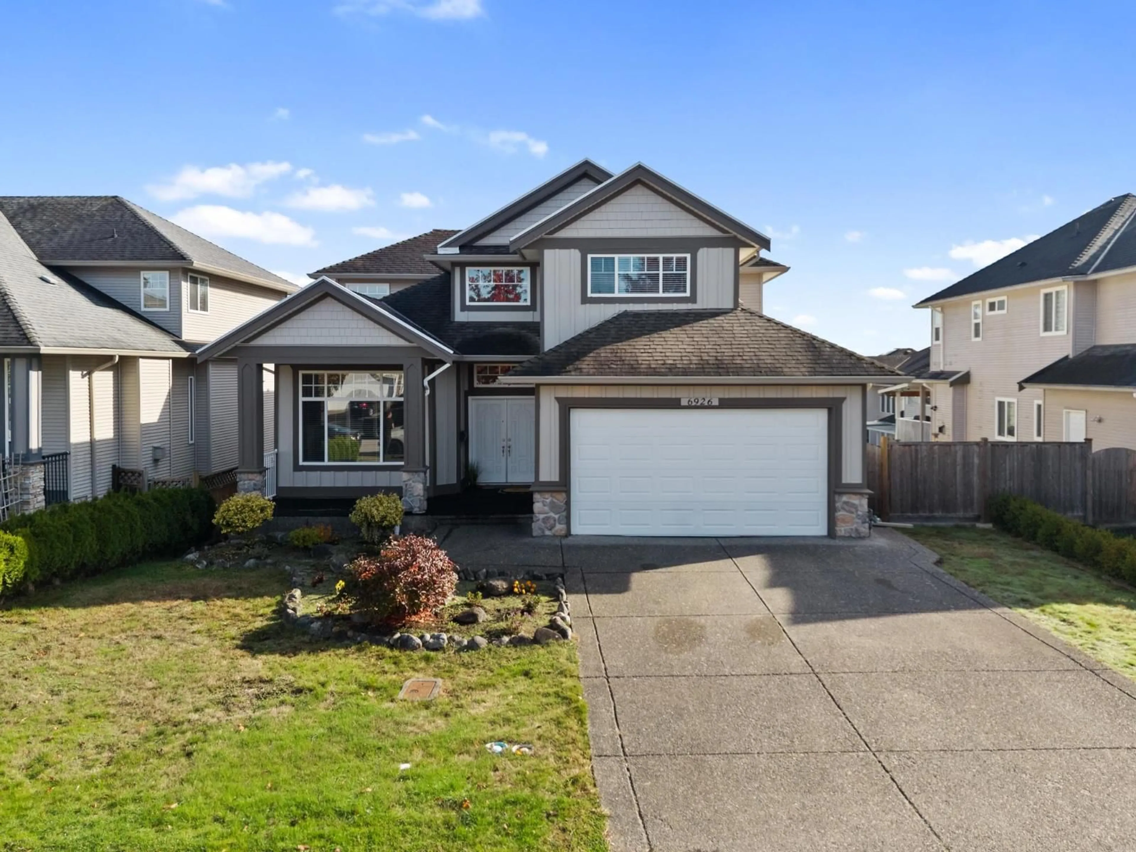 Home with vinyl exterior material, street for 6926 150 STREET, Surrey British Columbia V3S3J2
