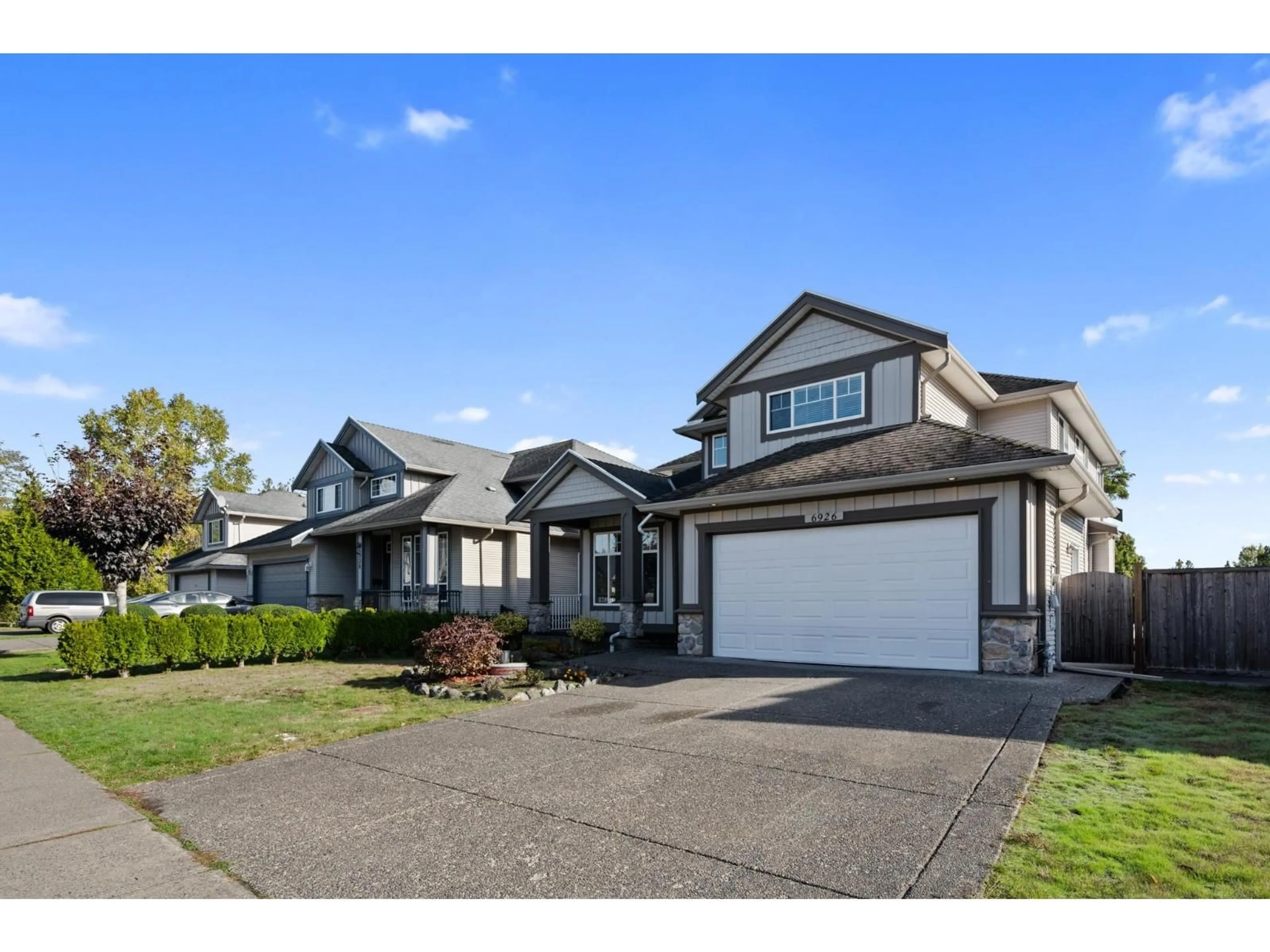 Home with vinyl exterior material, street for 6926 150 STREET, Surrey British Columbia V3S3J2