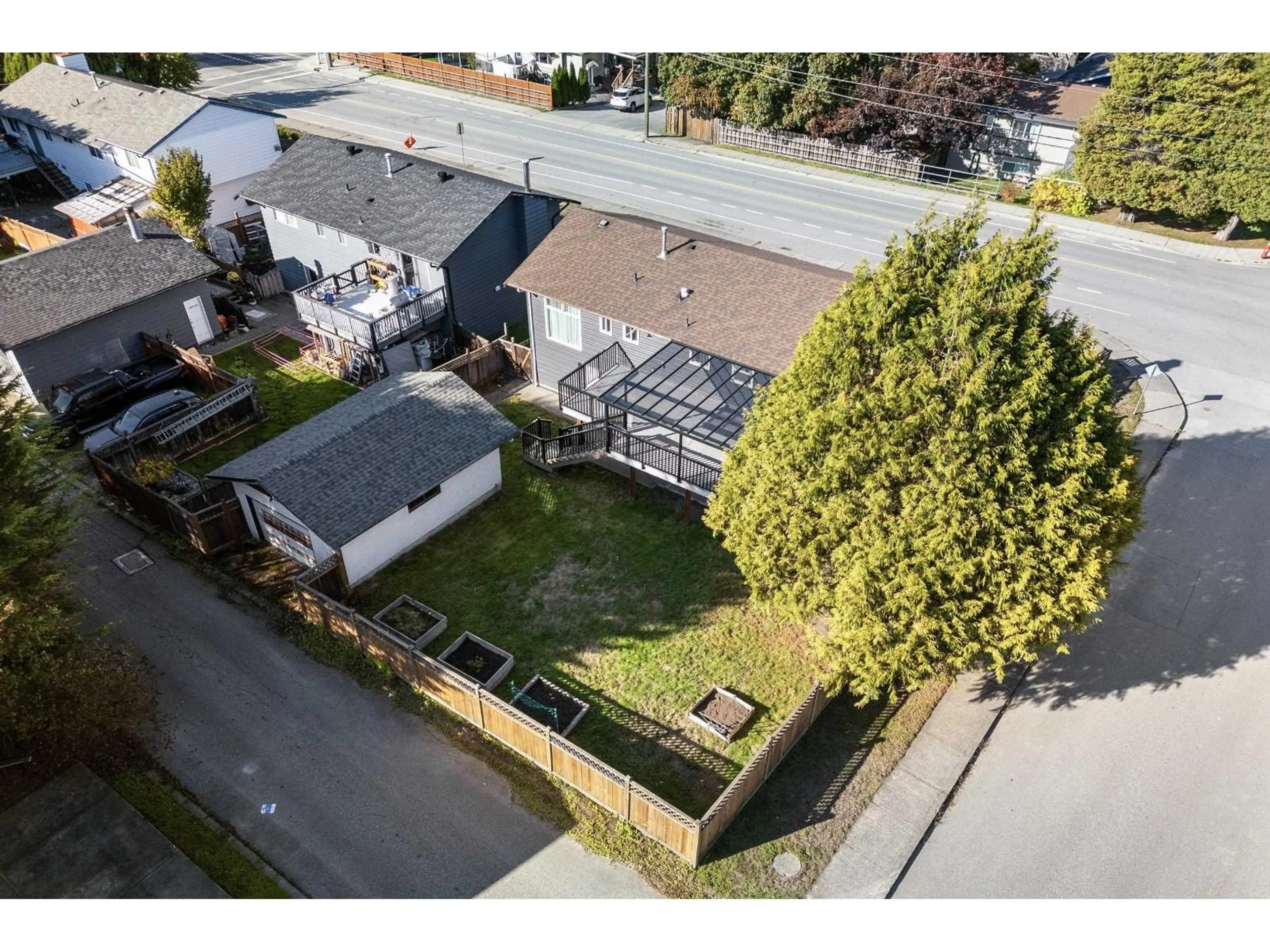 A pic from outside/outdoor area/front of a property/back of a property/a pic from drone, street for 20030 48 AVENUE, Langley British Columbia V3A6P3