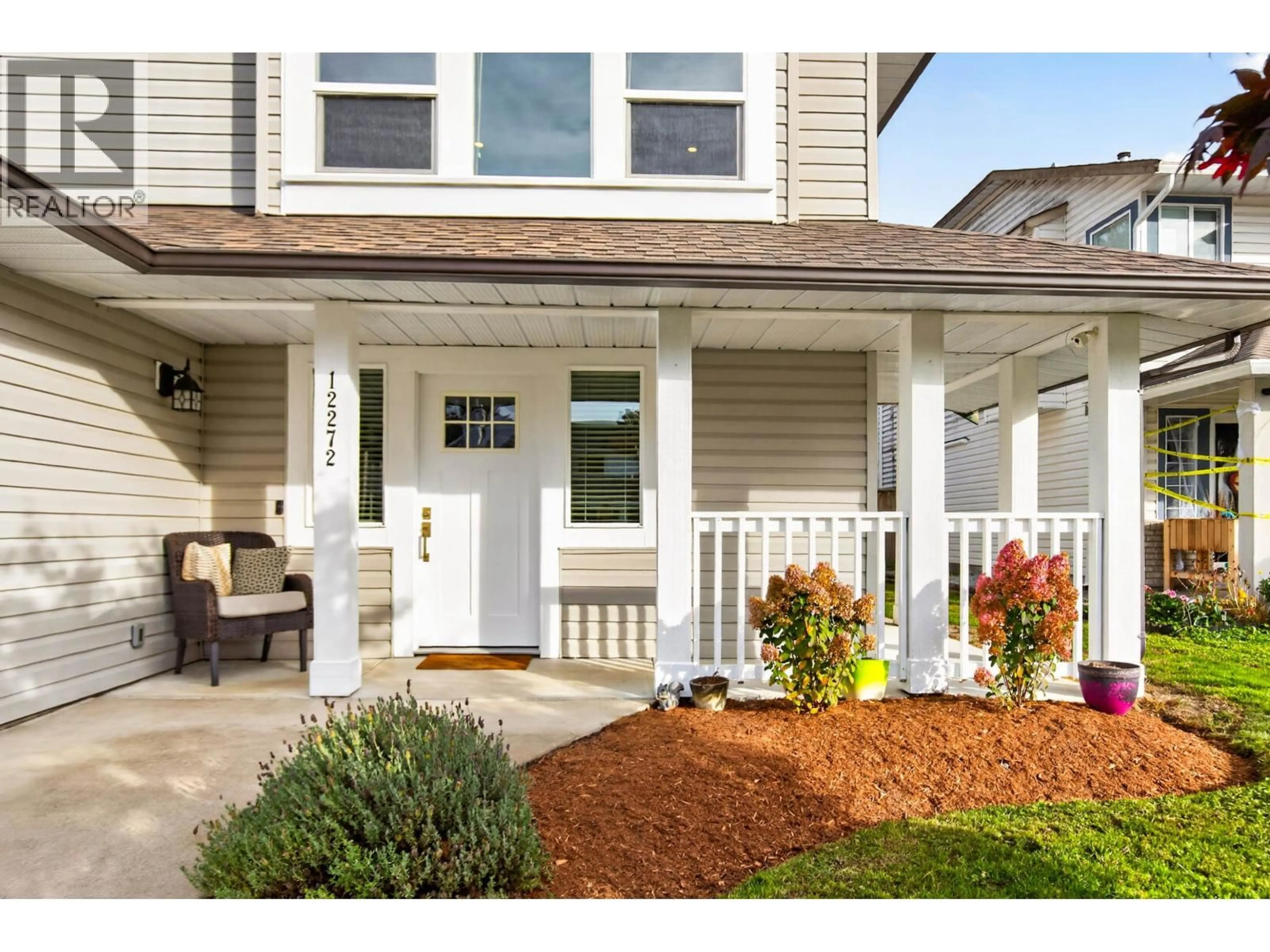 Home with vinyl exterior material, street for 12272 233A STREET, Maple Ridge British Columbia V2X0P7