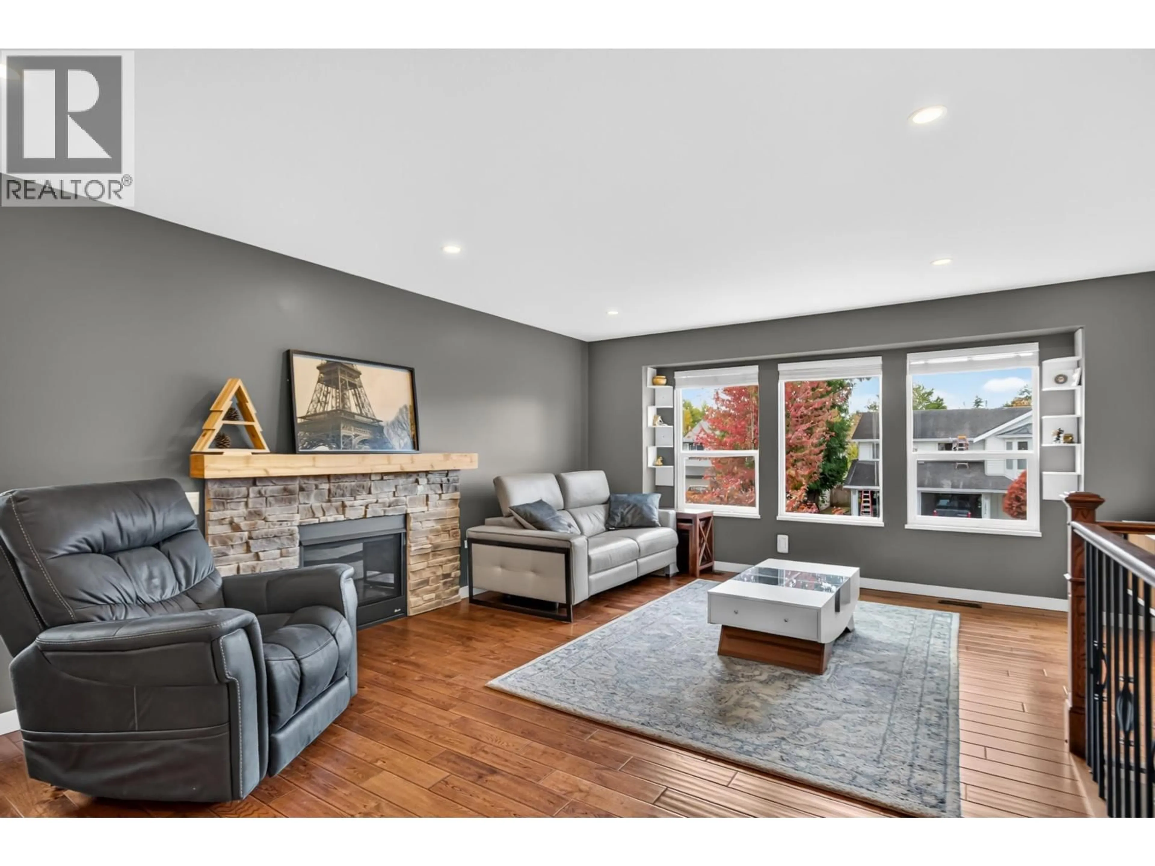 Living room with furniture, wood/laminate floor for 12272 233A STREET, Maple Ridge British Columbia V2X0P7