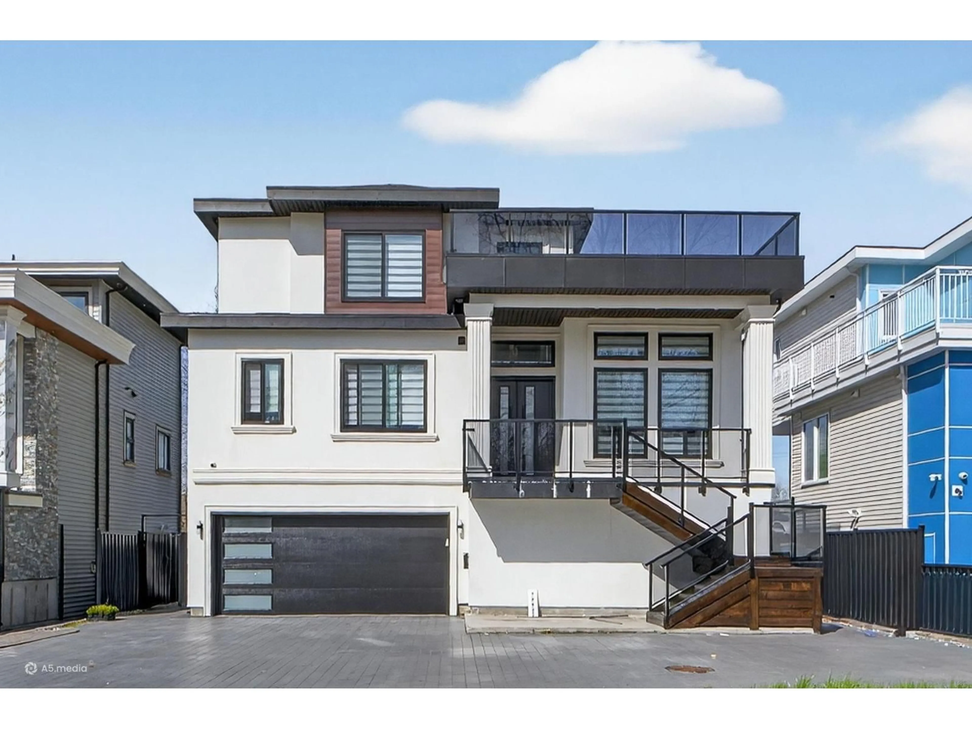 Home with vinyl exterior material, street for 12927 115A AVENUE, Surrey British Columbia V3R2R3
