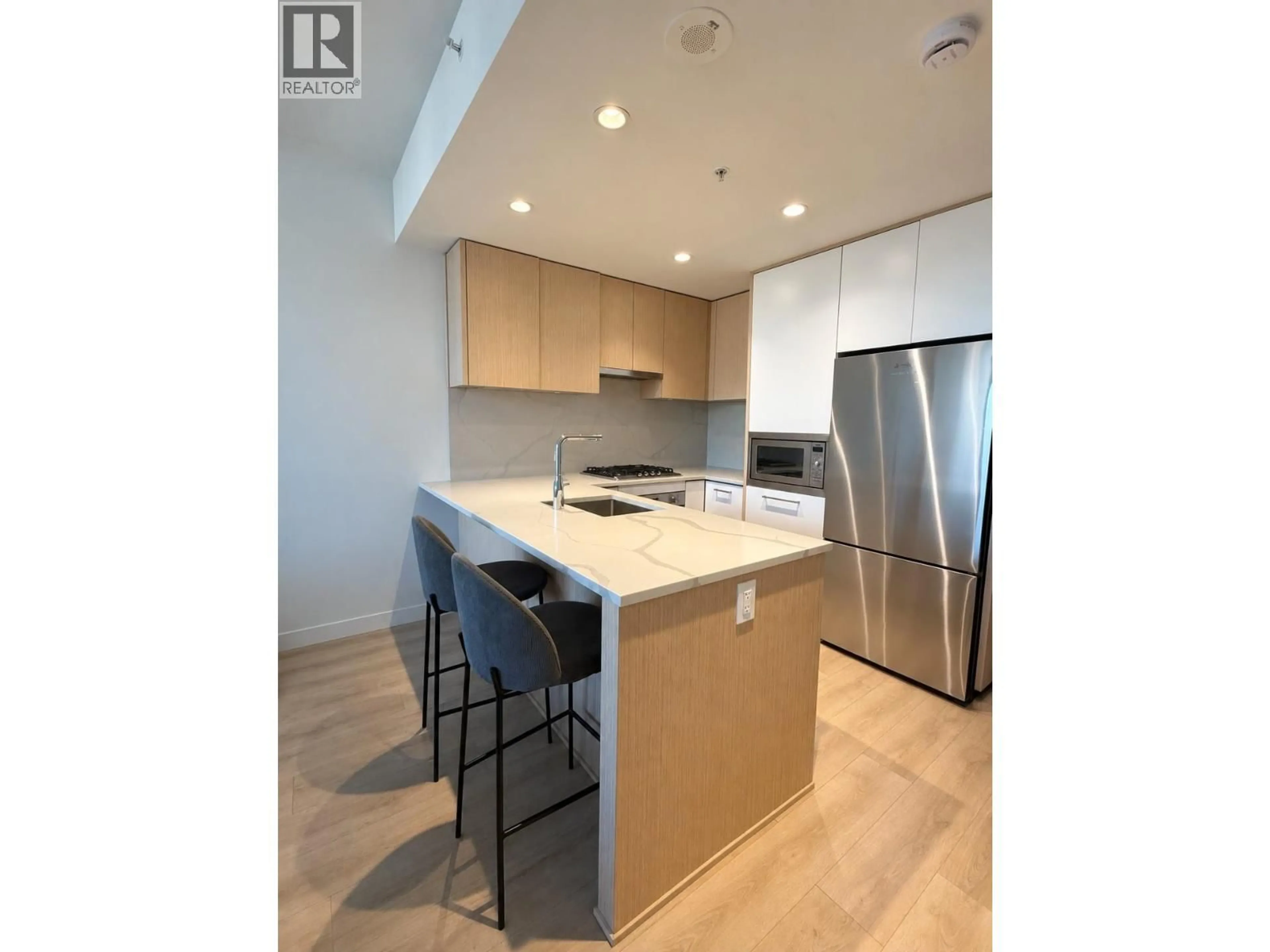 Open concept kitchen, unknown for 1705 - 567 CLARKE ROAD, Coquitlam British Columbia V3J0K7