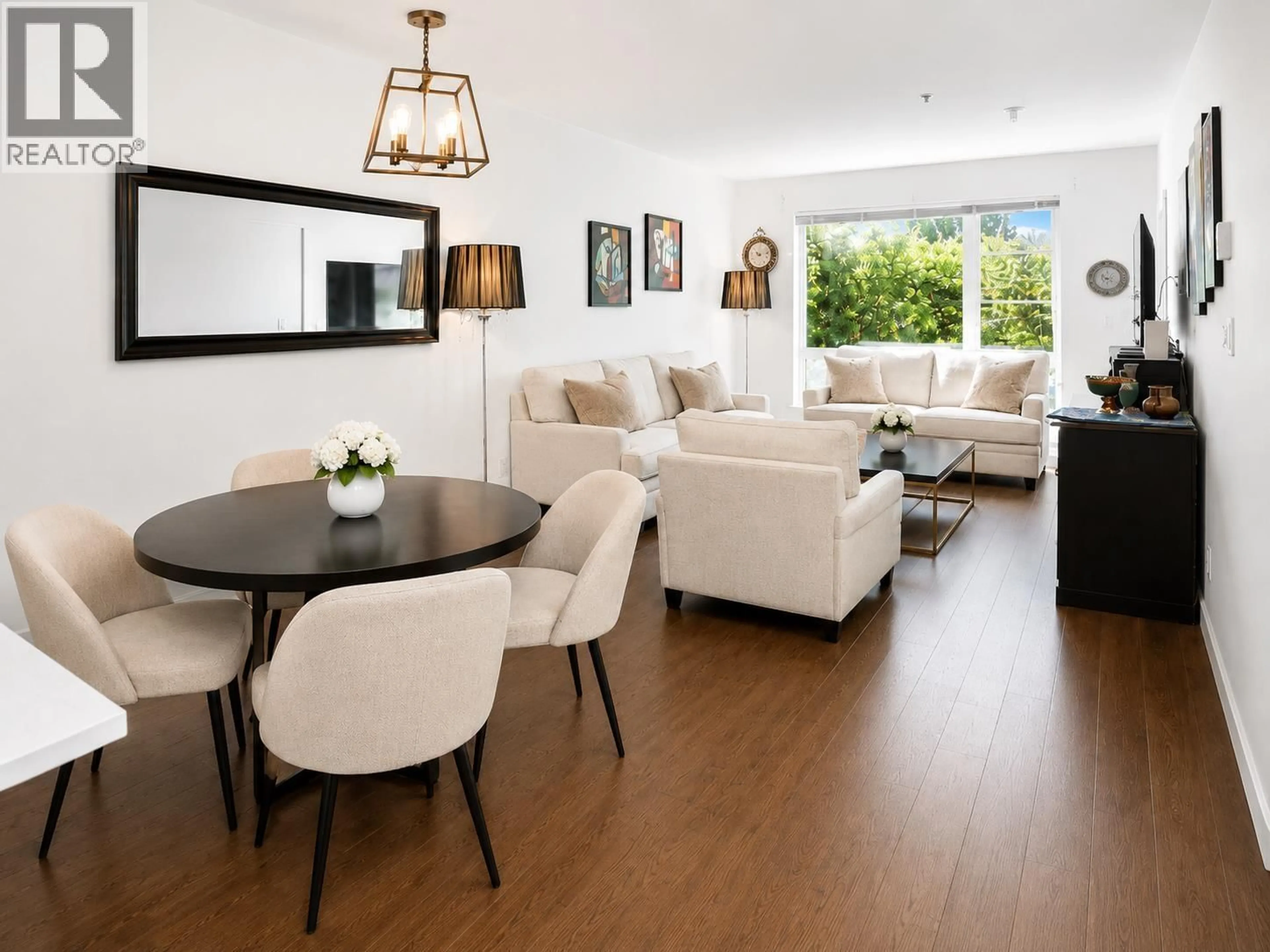 Living room with furniture, wood/laminate floor for 201 - 1330 MARINE DRIVE, North Vancouver British Columbia V7P1T4