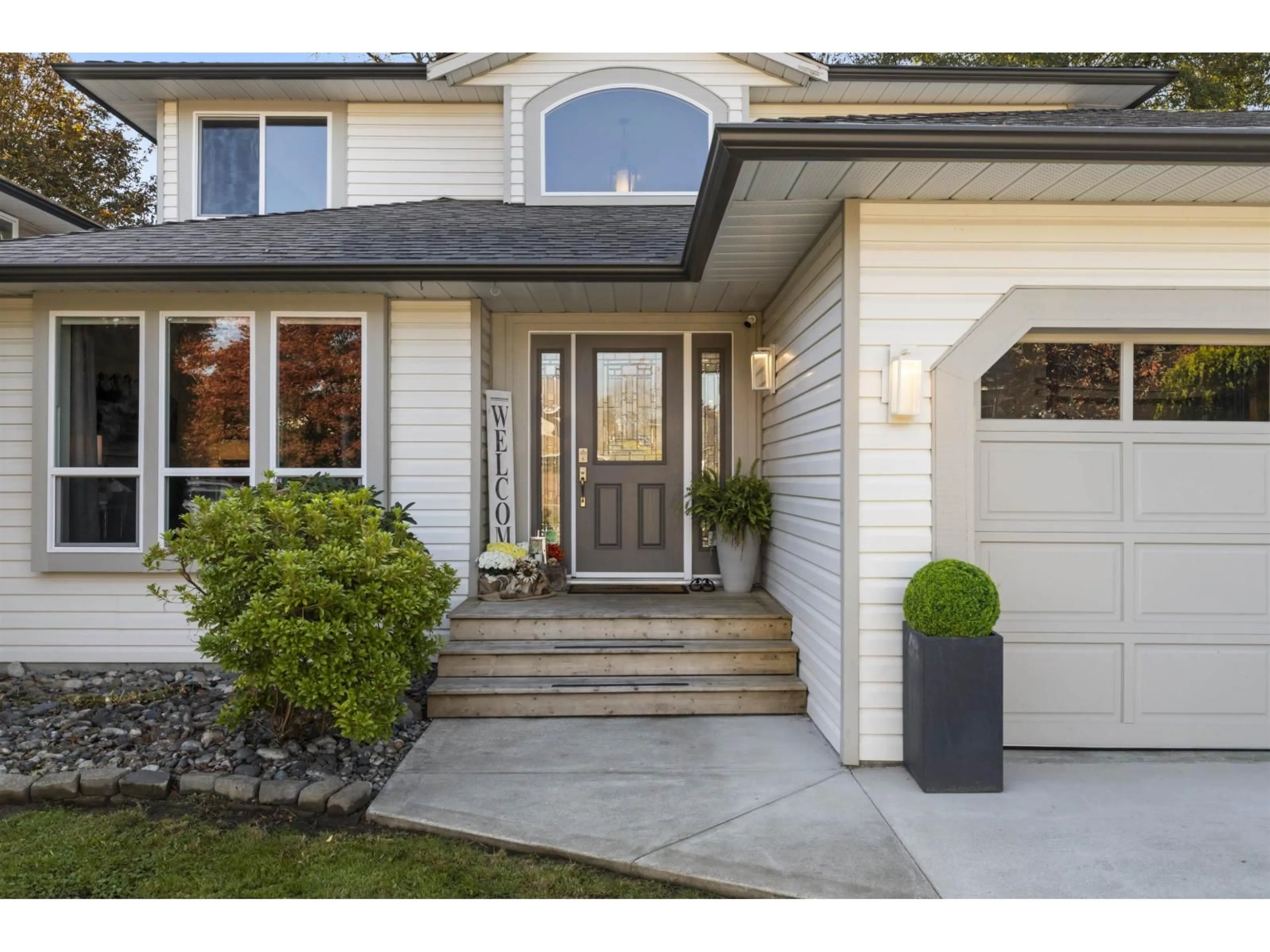 Home with vinyl exterior material, street for 21064 91A AVENUE, Langley British Columbia V1M2C4