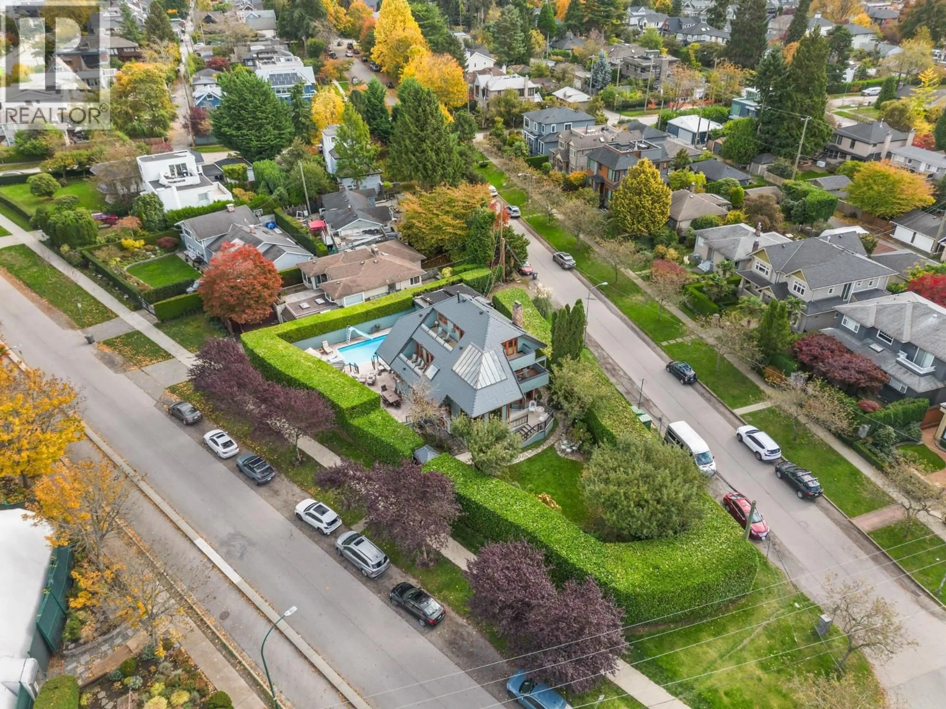 A pic from outside/outdoor area/front of a property/back of a property/a pic from drone, street for 3850 POINT GREY ROAD, Vancouver British Columbia V6R1B4
