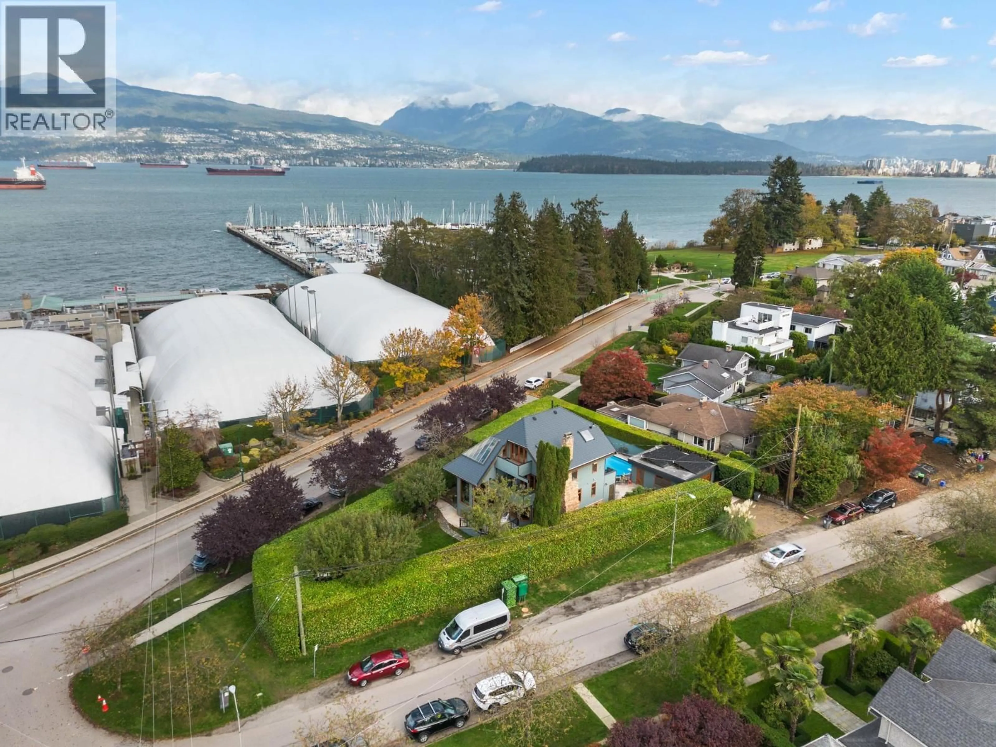 A pic from outside/outdoor area/front of a property/back of a property/a pic from drone, water/lake/river/ocean view for 3850 POINT GREY ROAD, Vancouver British Columbia V6R1B4
