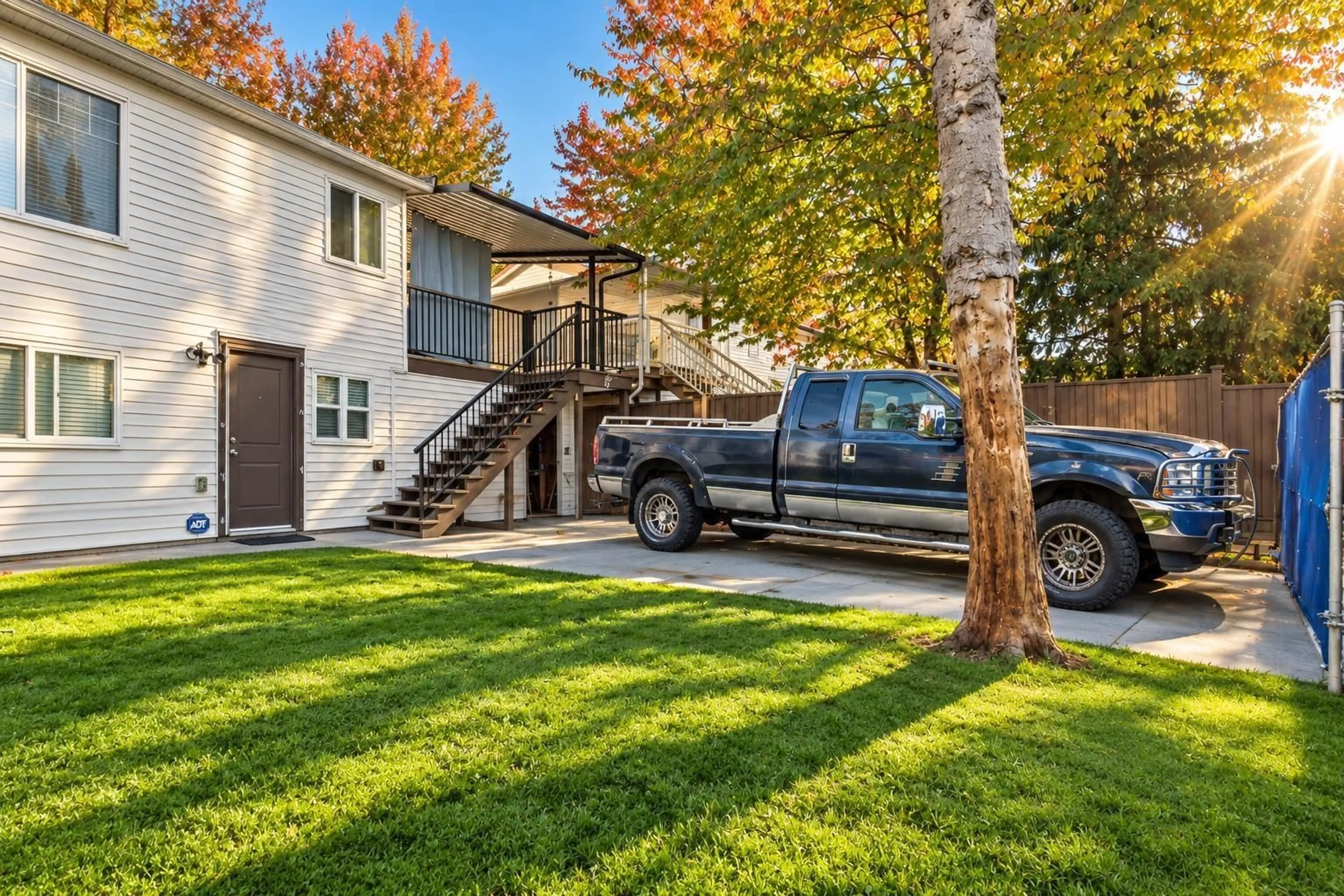 Home with vinyl exterior material, street for 15159 93 AVENUE, Surrey British Columbia V3R7A7