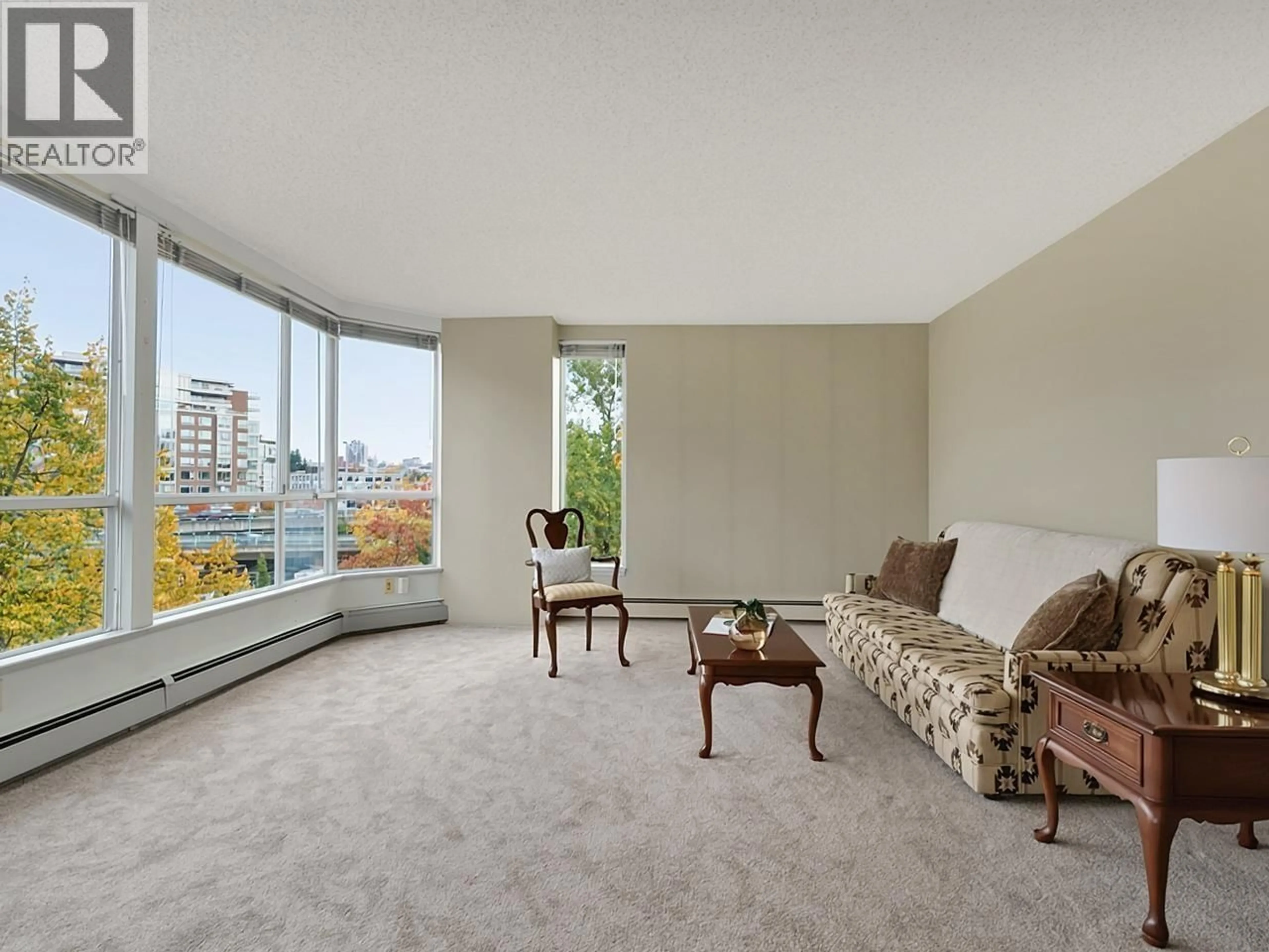 Living room with furniture, carpet floor for 618 - 518 MOBERLY ROAD, Vancouver British Columbia V5Z4G3