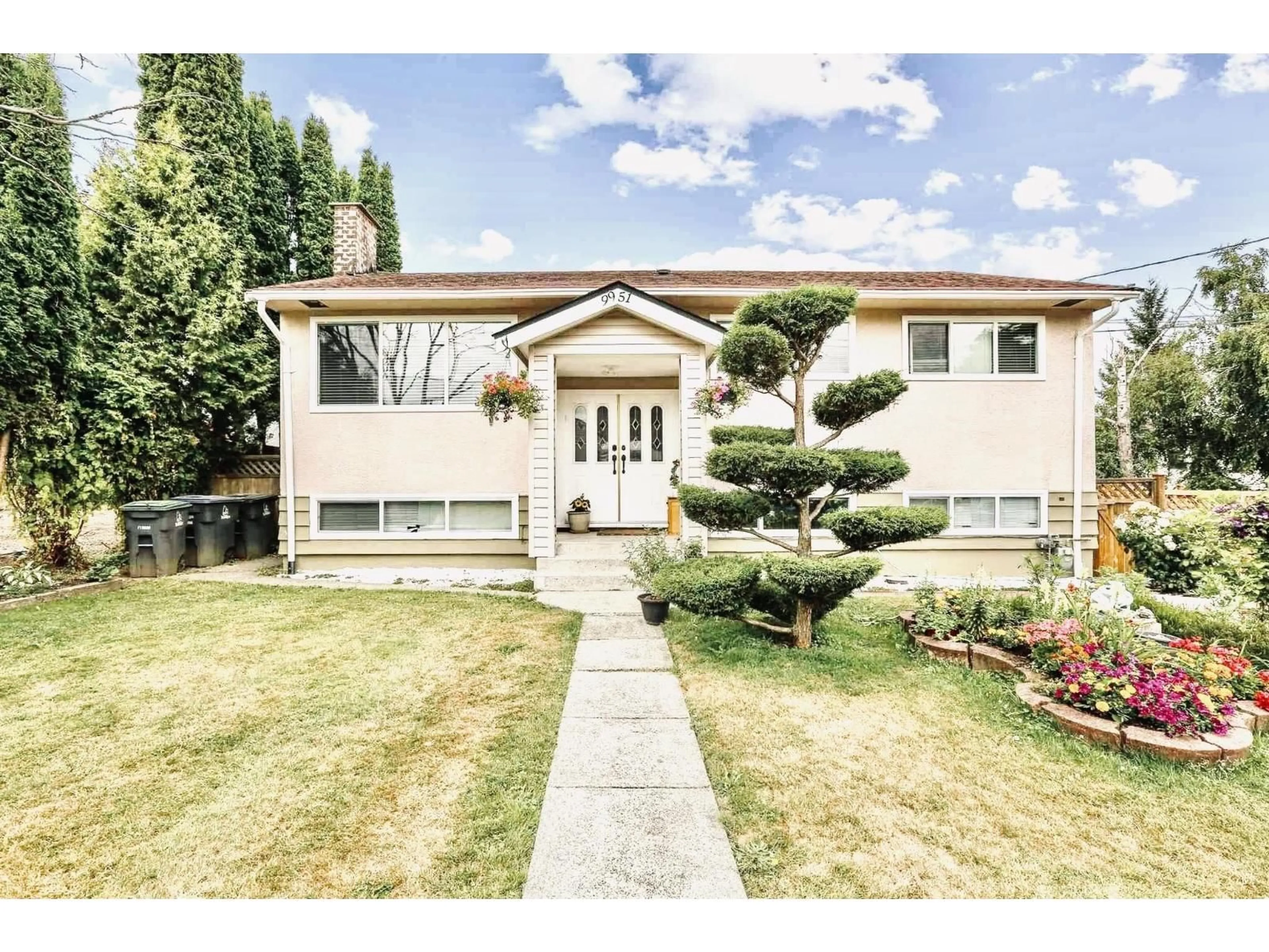 Home with vinyl exterior material, street for 9951 124A STREET, Surrey British Columbia V3V4W4