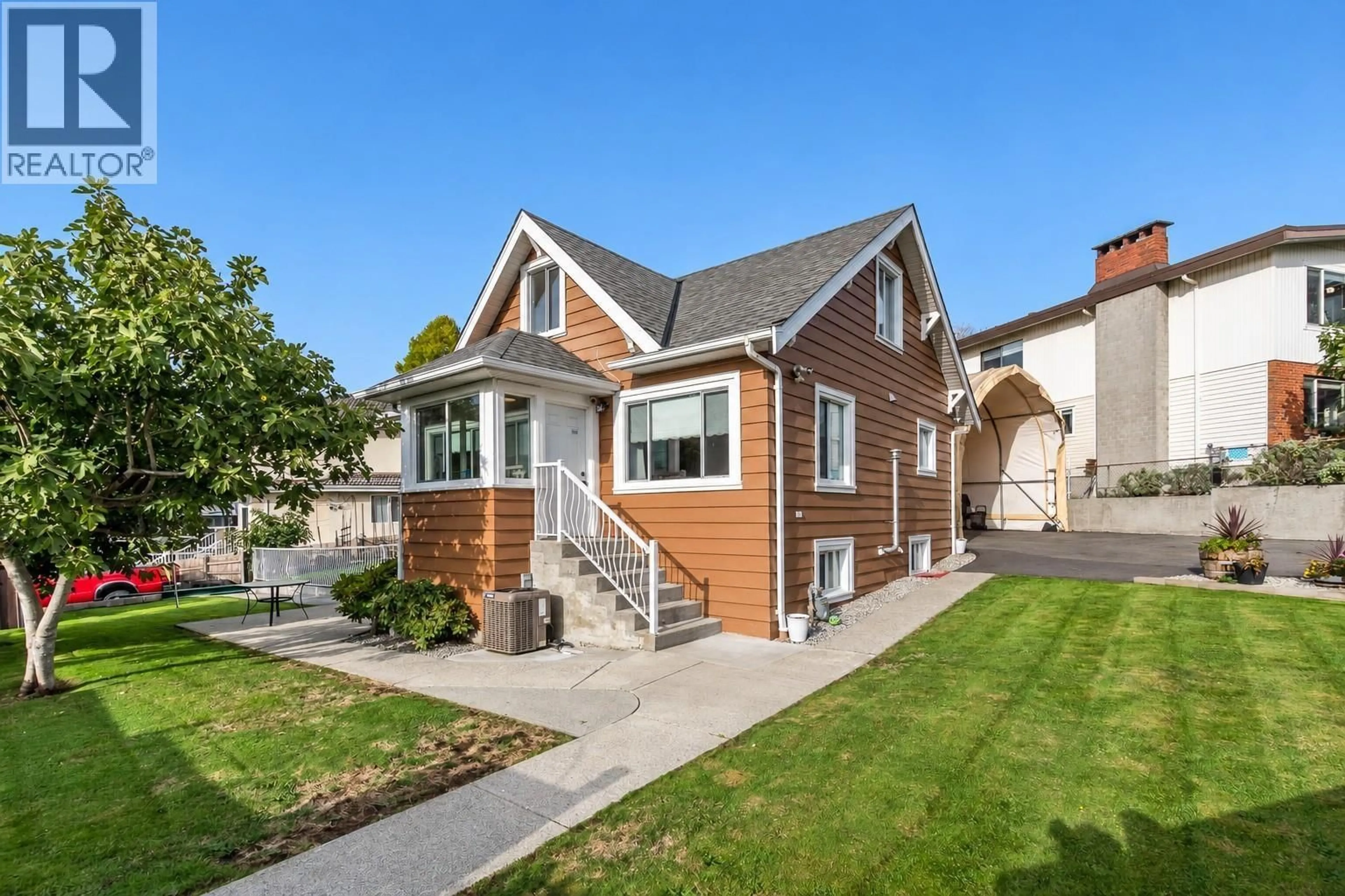 Home with vinyl exterior material, street for 1276 DOUGLAS ROAD, Burnaby British Columbia V5C4Z9