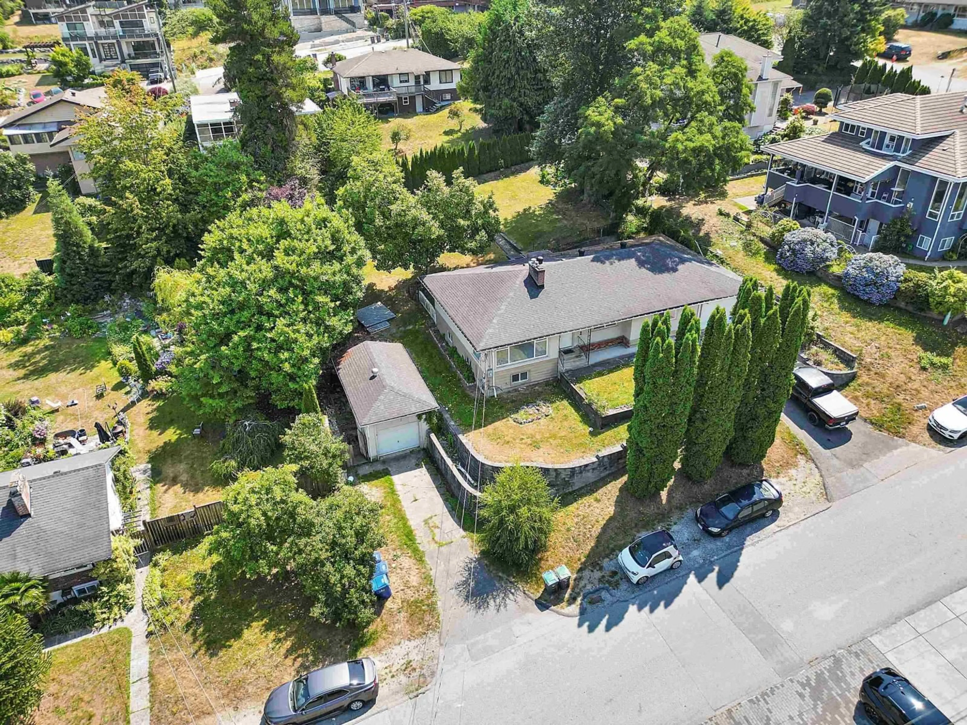 A pic from outside/outdoor area/front of a property/back of a property/a pic from drone, street for 11028 129A STREET, Surrey British Columbia V3T3L1