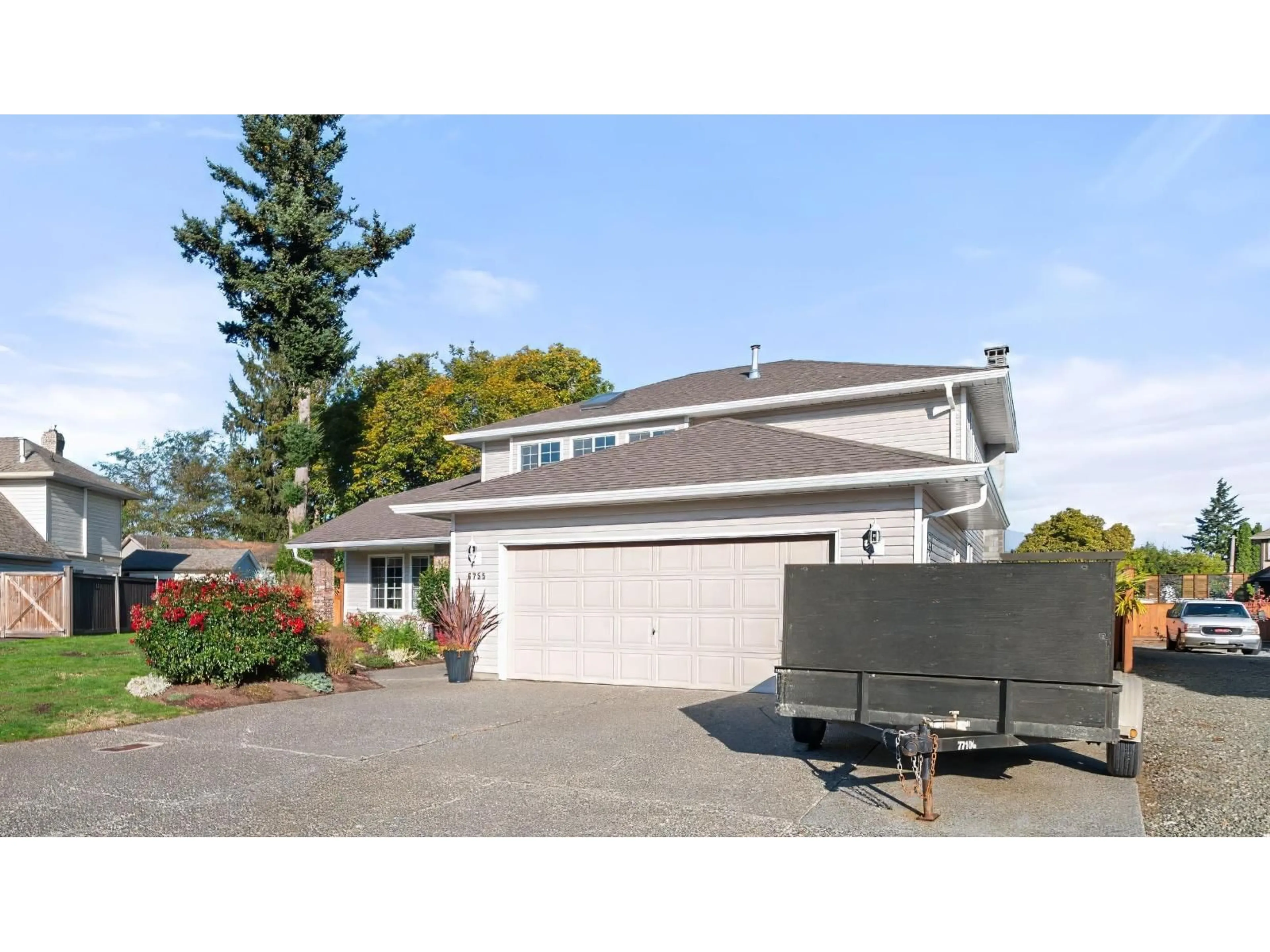 Home with vinyl exterior material, street for 6755 HENRY STREET, Sardis British Columbia V2R2Z9