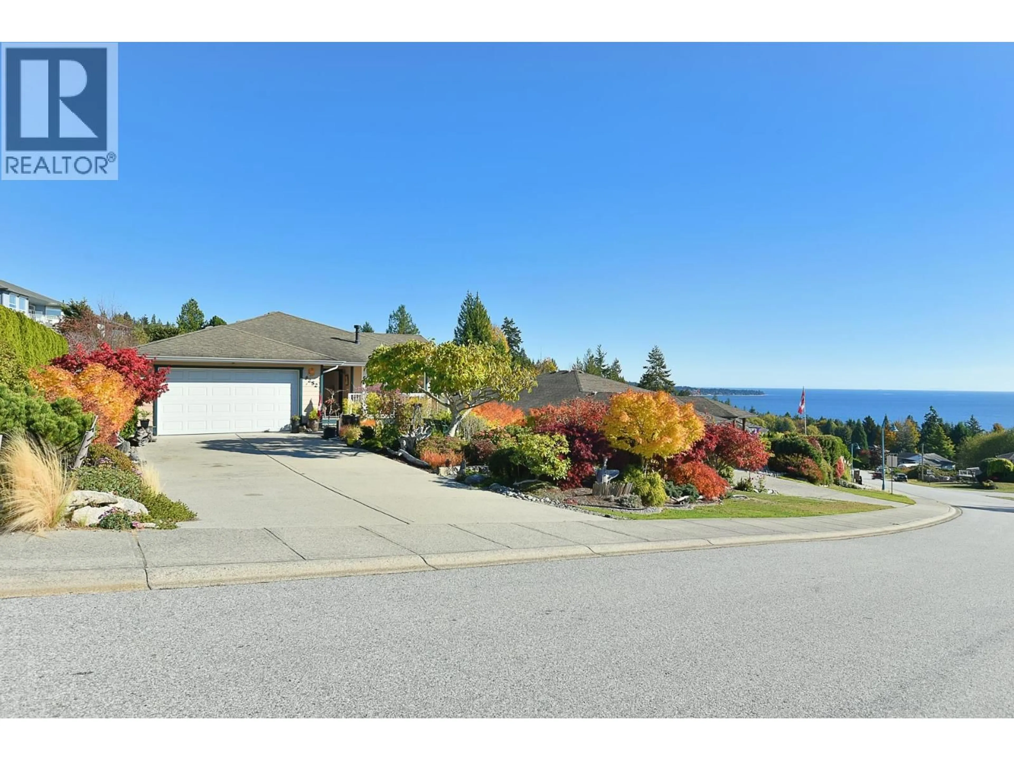 A pic from outside/outdoor area/front of a property/back of a property/a pic from drone, water/lake/river/ocean view for 6252 BAILLIE ROAD, Sechelt British Columbia V7Z0R5