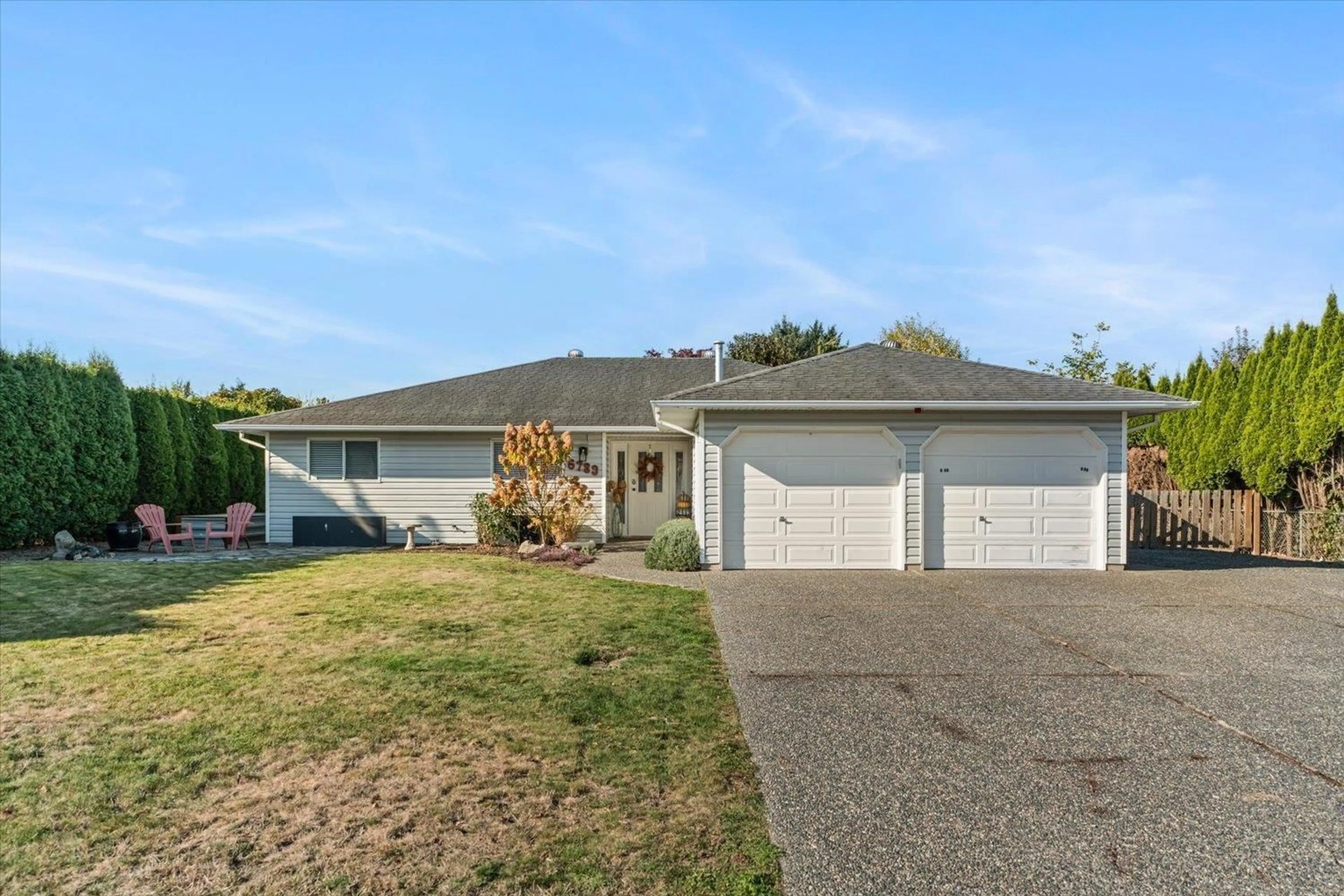 A pic from outside/outdoor area/front of a property/back of a property/a pic from drone, street for 6783 VANMAR STREET, Chilliwack British Columbia V2R2W1