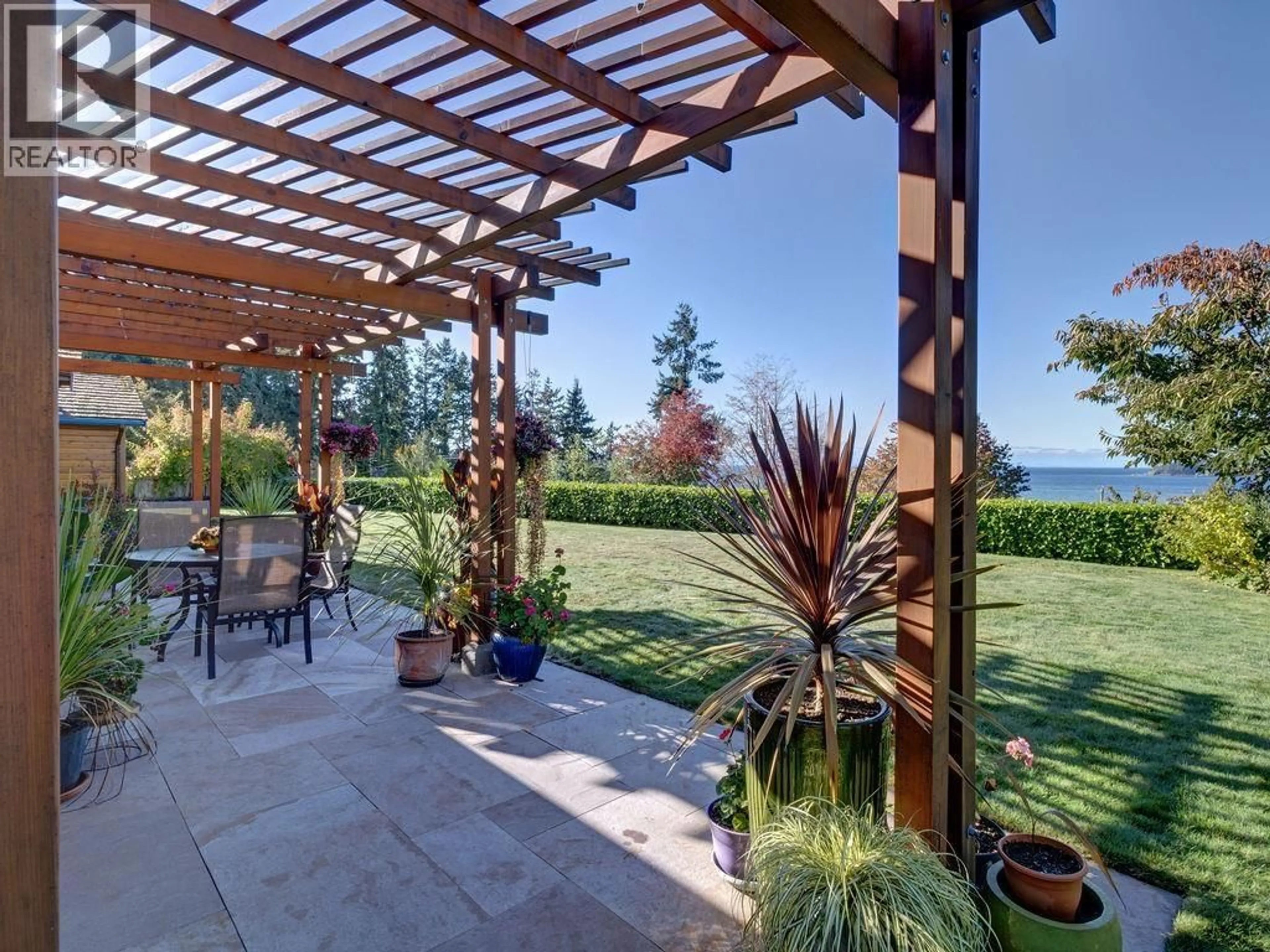 Patio, water/lake/river/ocean view for 5229 YACHT ROAD, Sechelt British Columbia V7Z0C1